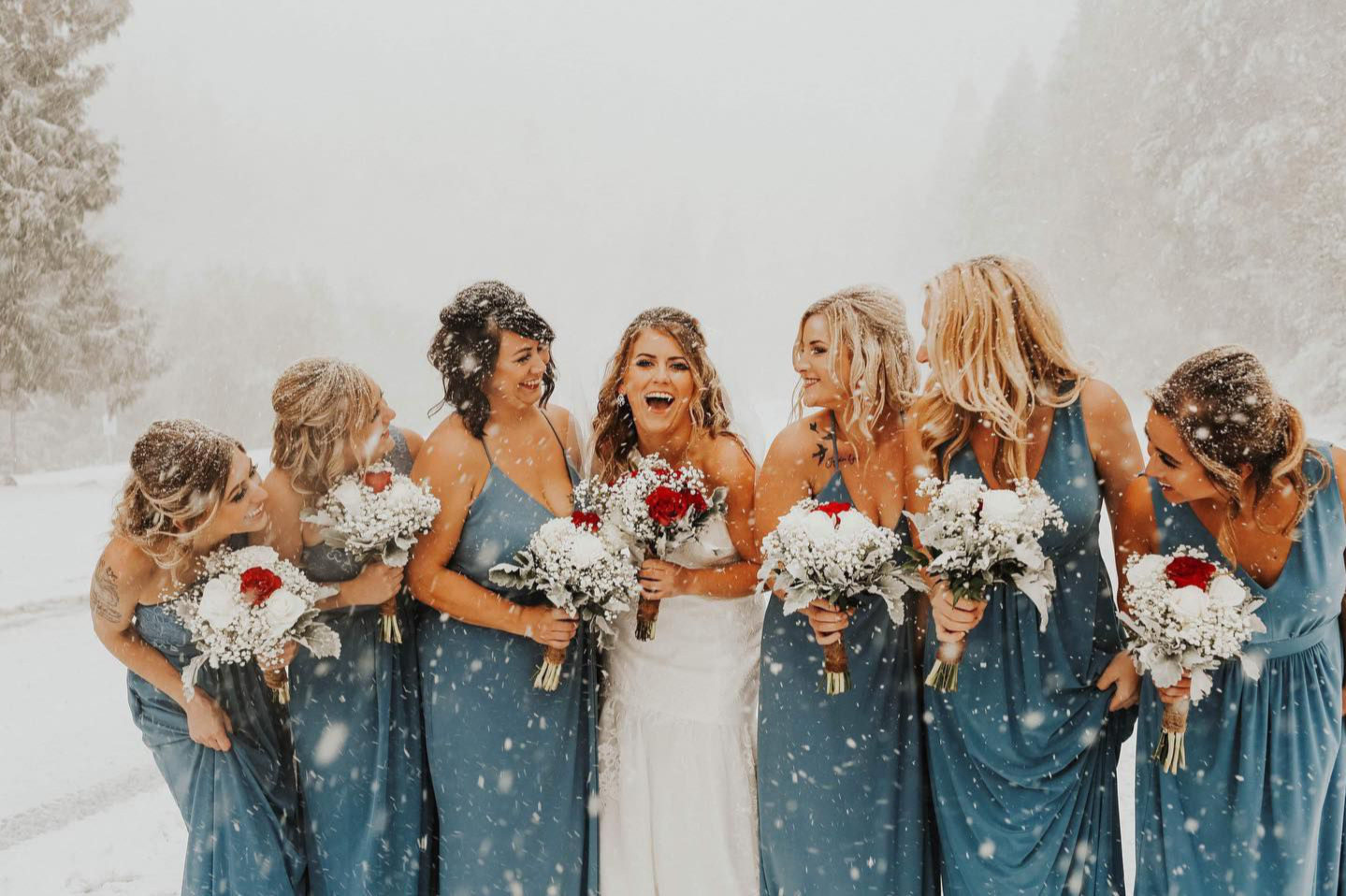 bridal party, snowing, blue bridesmaid dresses