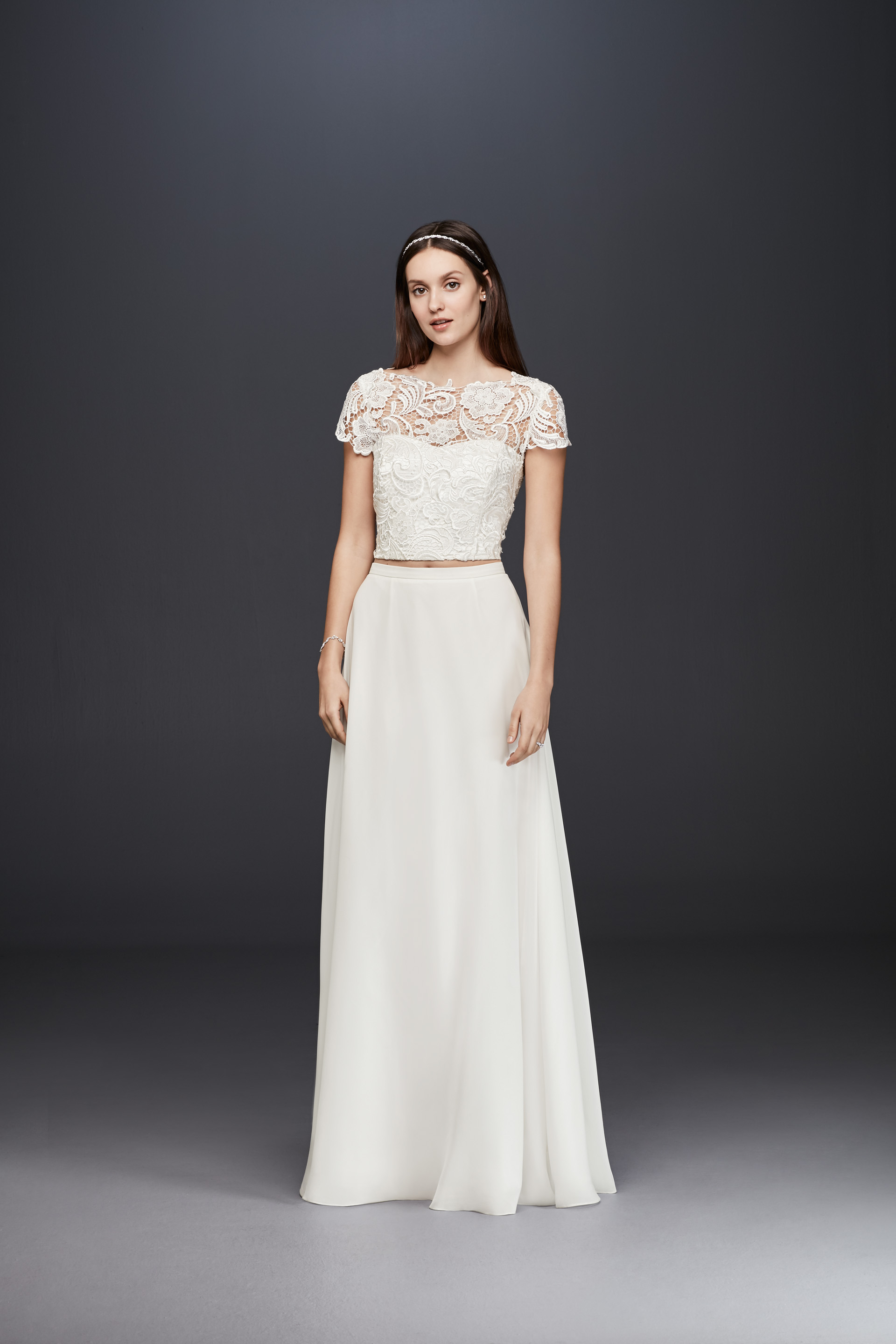 Lace cap sleeve crop top dress for a look inspired by Pippa Middleton's wedding dress. See more Pippa inspired wedding dresses on the David's Bridal blog.