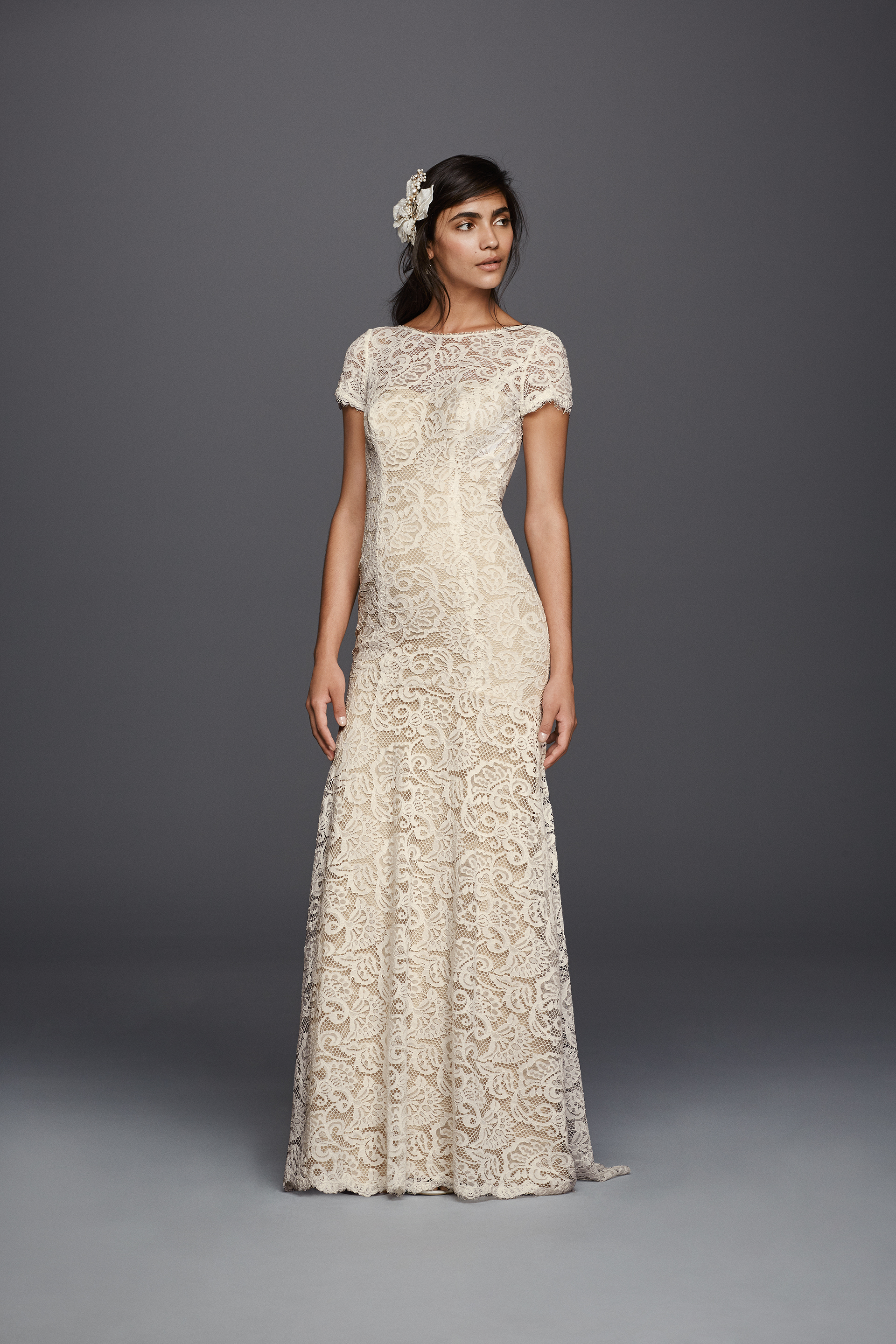 Lace wedding dress with short sleeves for a look like Pippa Middleton's wedding dress. See more dresses with Pippa-like details on the David's Bridal blog.