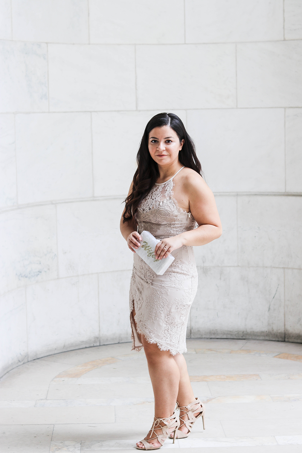 Blogger Teresa of Money Can Buy Lipstick in a lace halter mini dress, her pick for an engagement party. See more on the David's Bridal blog - www.davidsbridal.com/blog