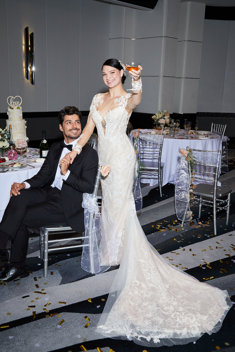 Woman in long-sleeved wedding dress