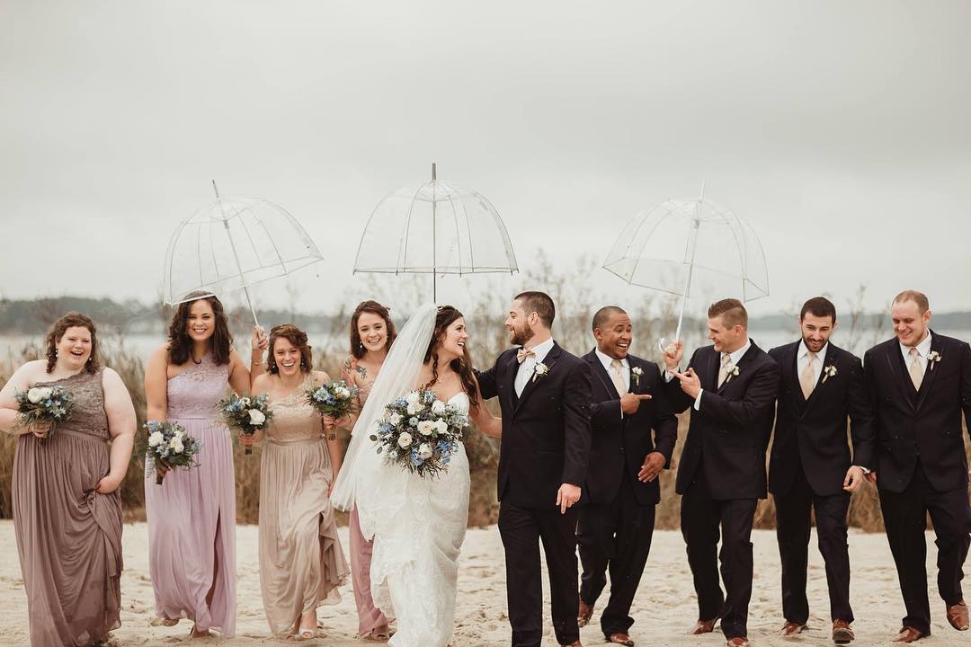 Tips for a Rainy Day Wedding. See more on the David's Bridal blog: www.davidsbridal.com/blog Image c/o @madeleineayers_