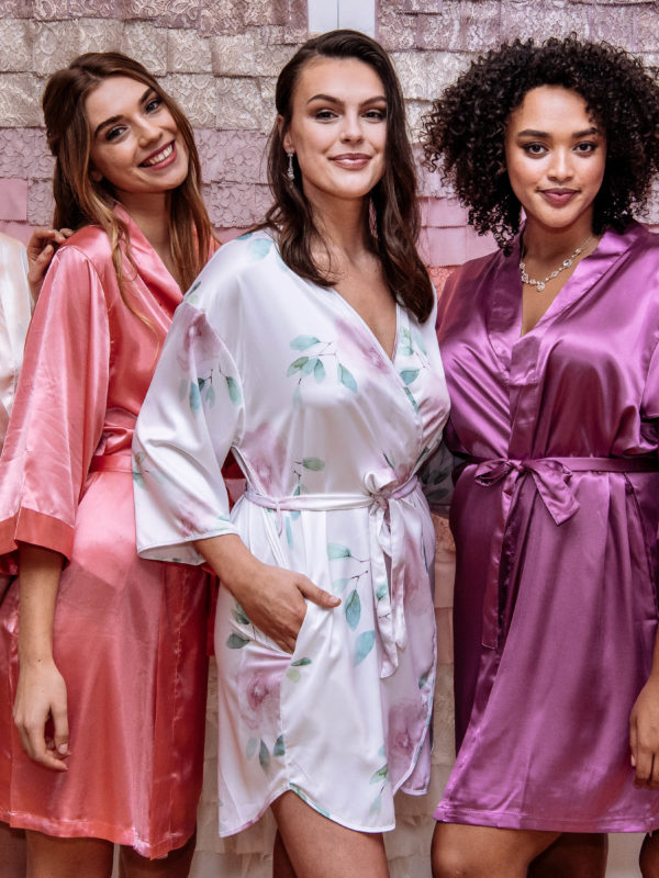 Bridesmaids in colorful bridal party robes