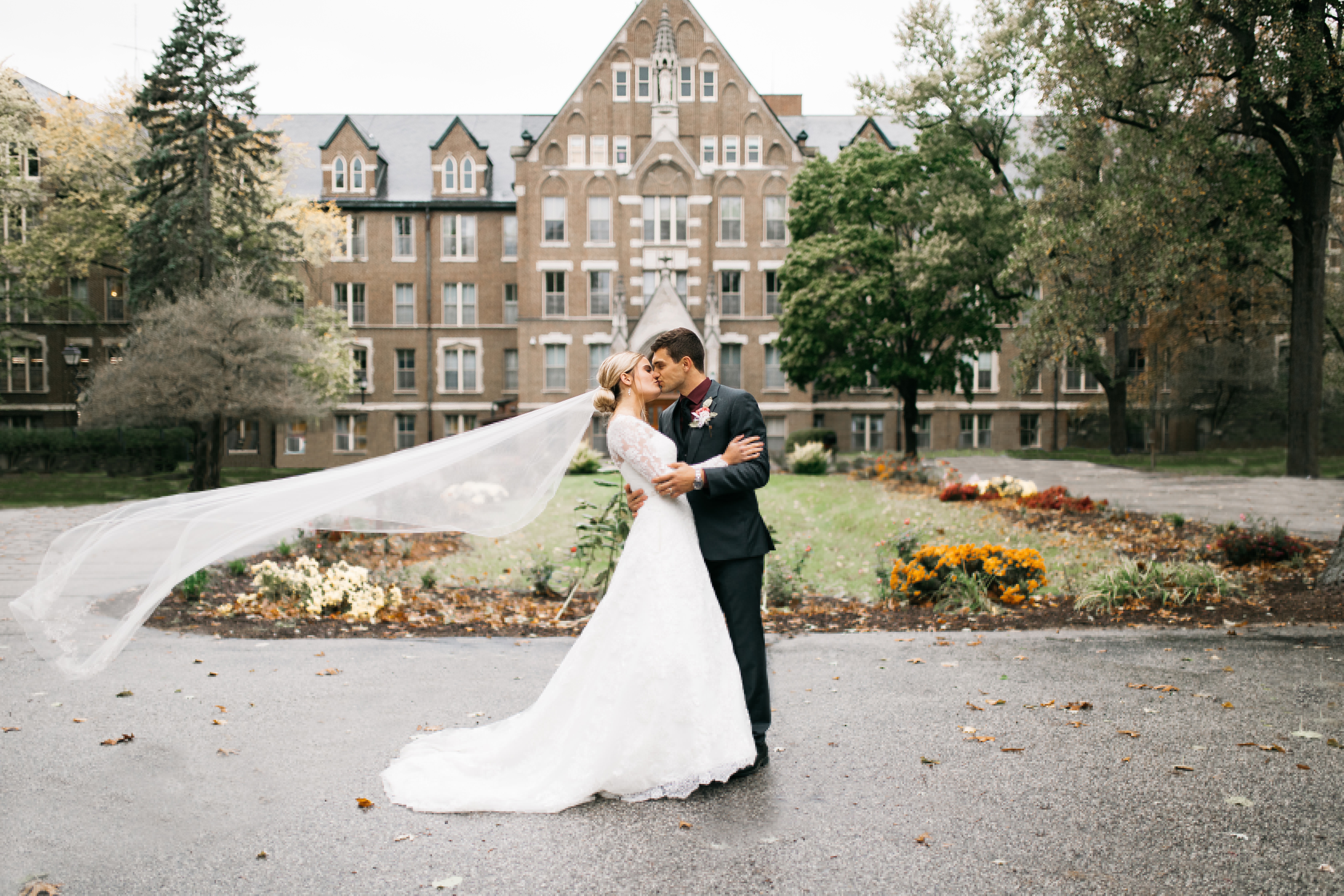 Bride with a cathedral length veil blowing in the wind | | Insta-Worthy Veils