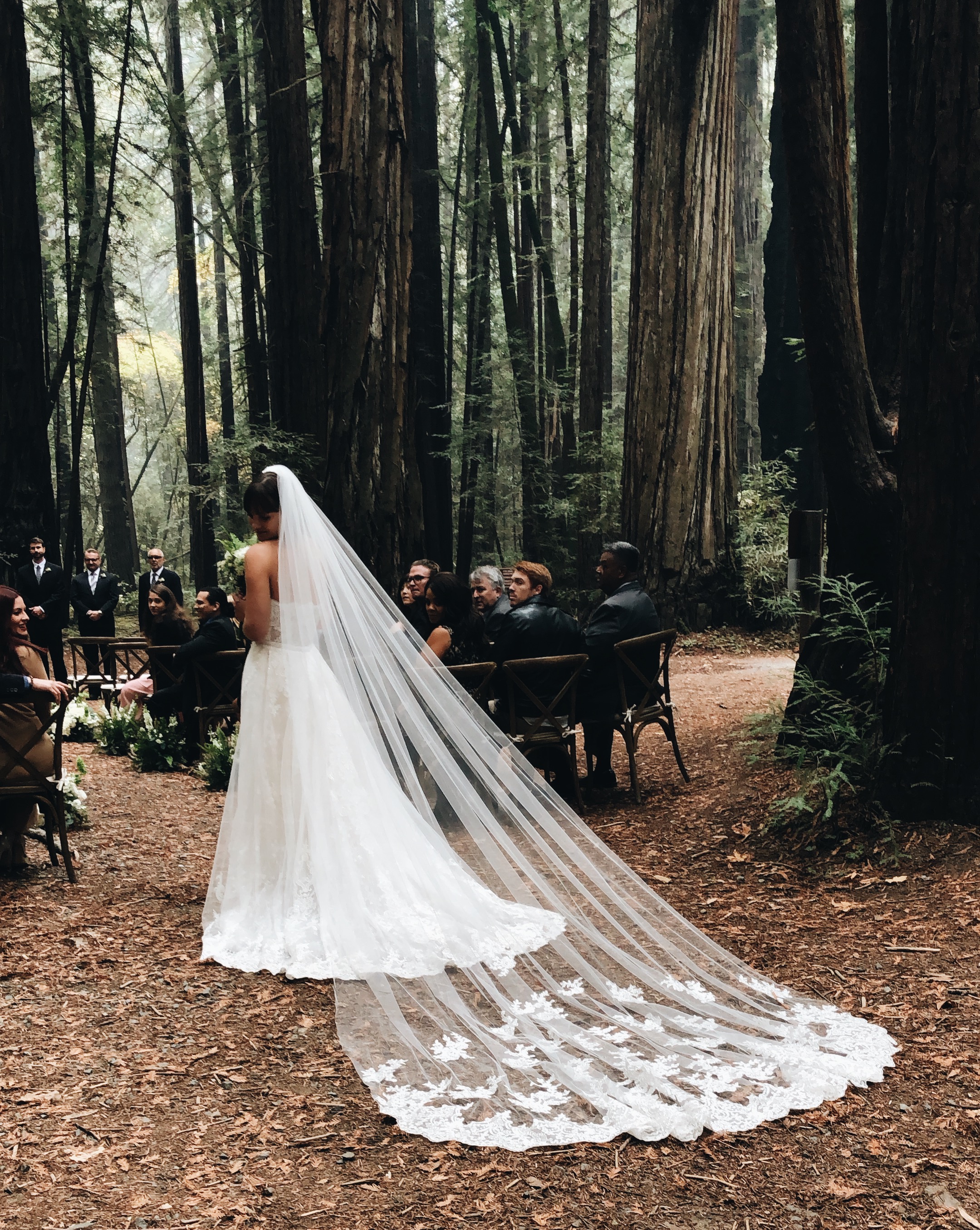 Bride in Forest wearing a Cathedral Lace Veil | Insta-Worthy Veils