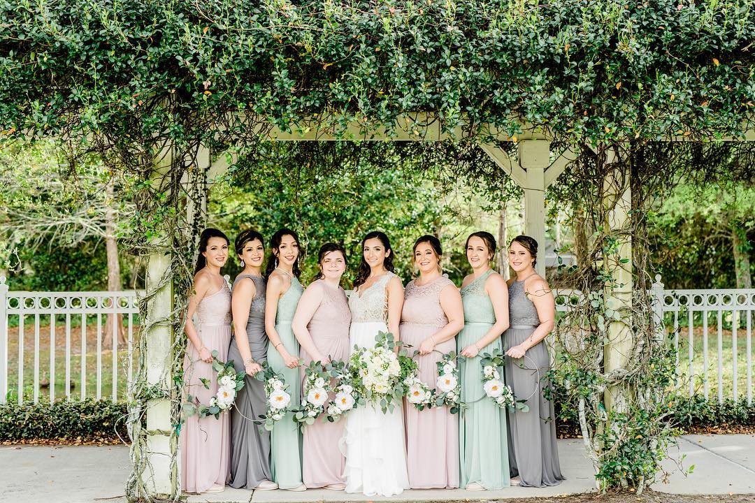 Bridesmaids holding floral wreaths or hoop bouquets | Nontraditional Wedding Bouquet Ideas