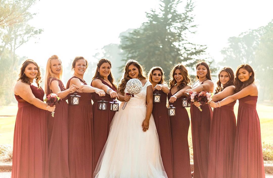 Bridesmaids holding small lanterns | Nontraditional Wedding Bouquet Ideas