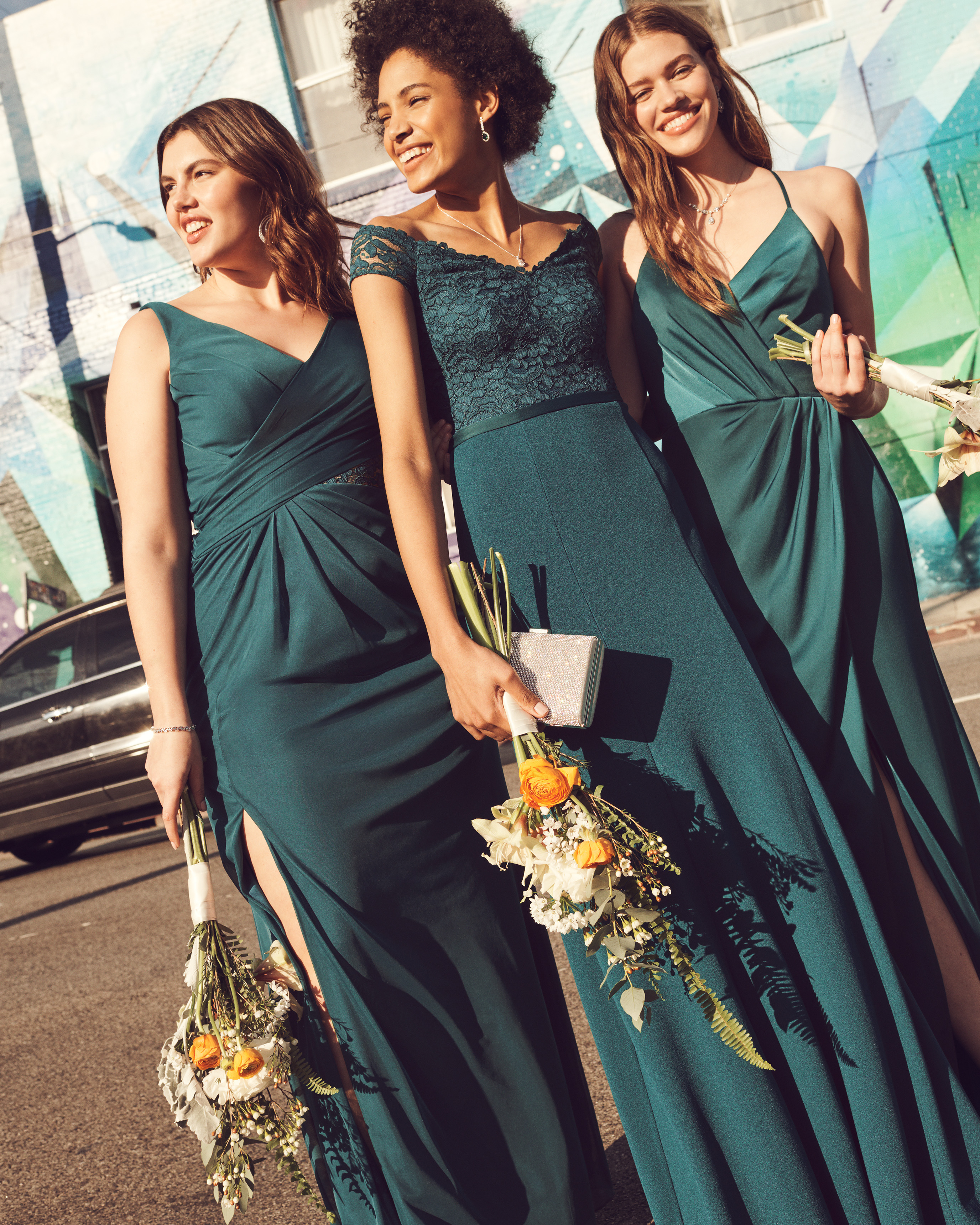 Bridesmaids in green long dresses with lace