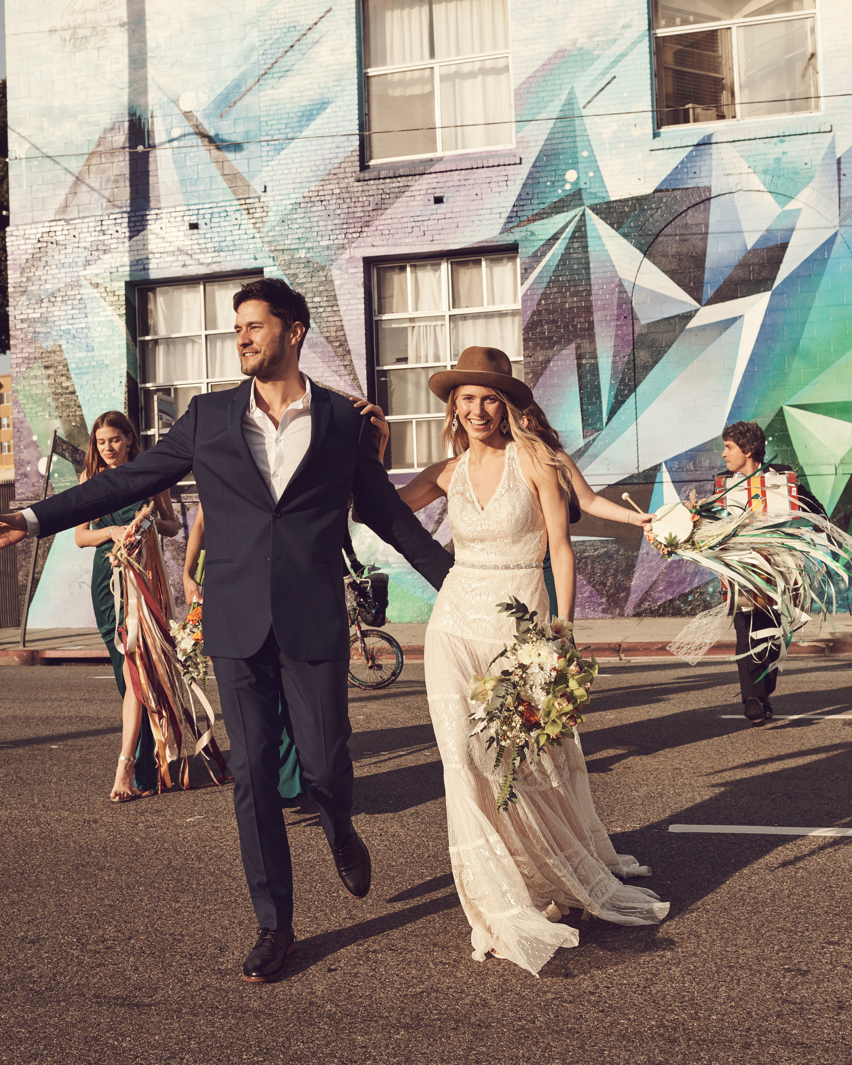 Bride and Groom walking through street