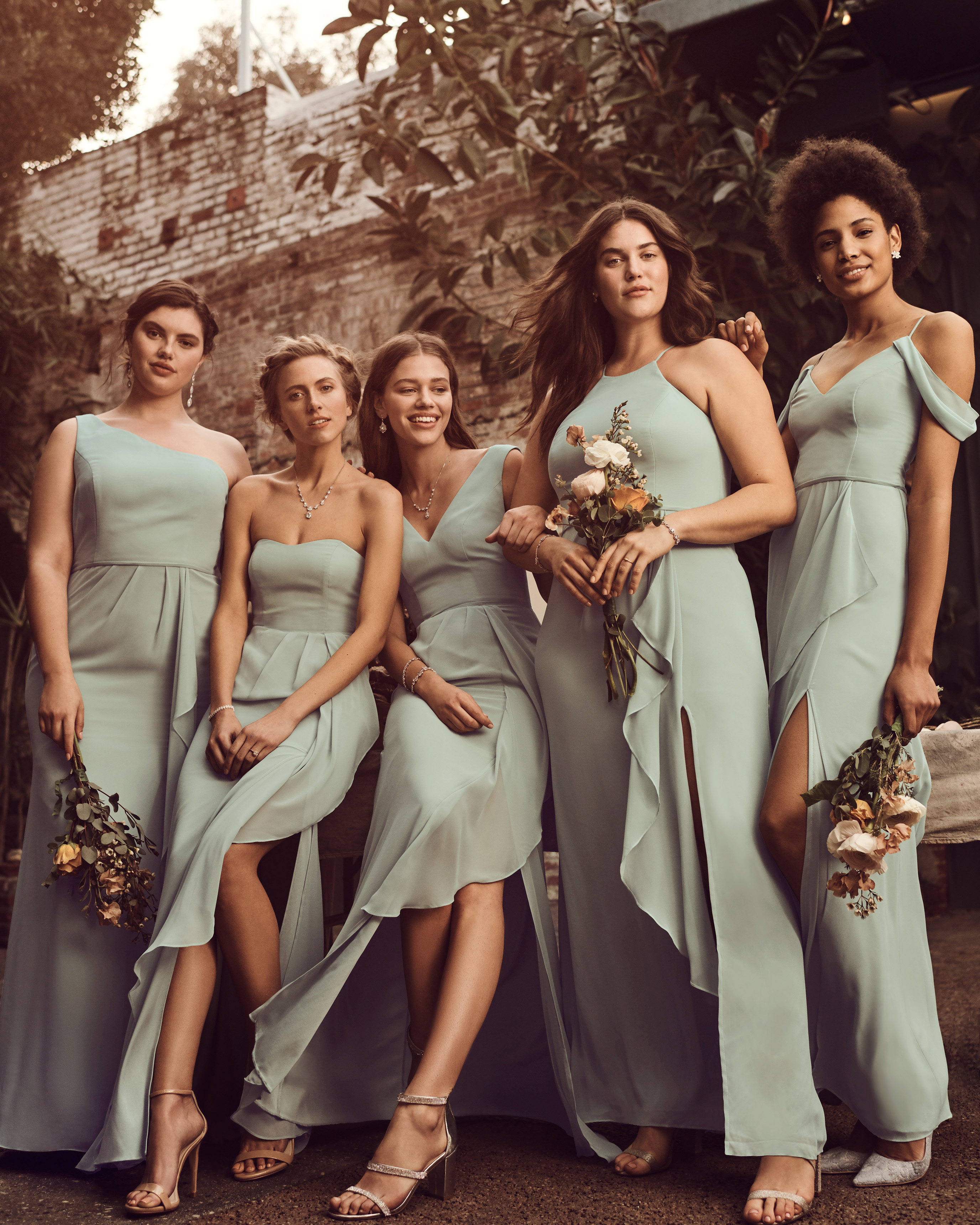 Five bridesmaids in dusty sage long bridesmaid dresses