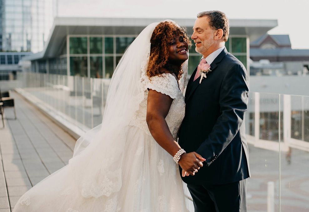 Bride and Groom Holding Hands