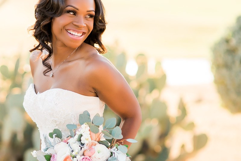 Close up shot of bride Eboni with floral bouquet