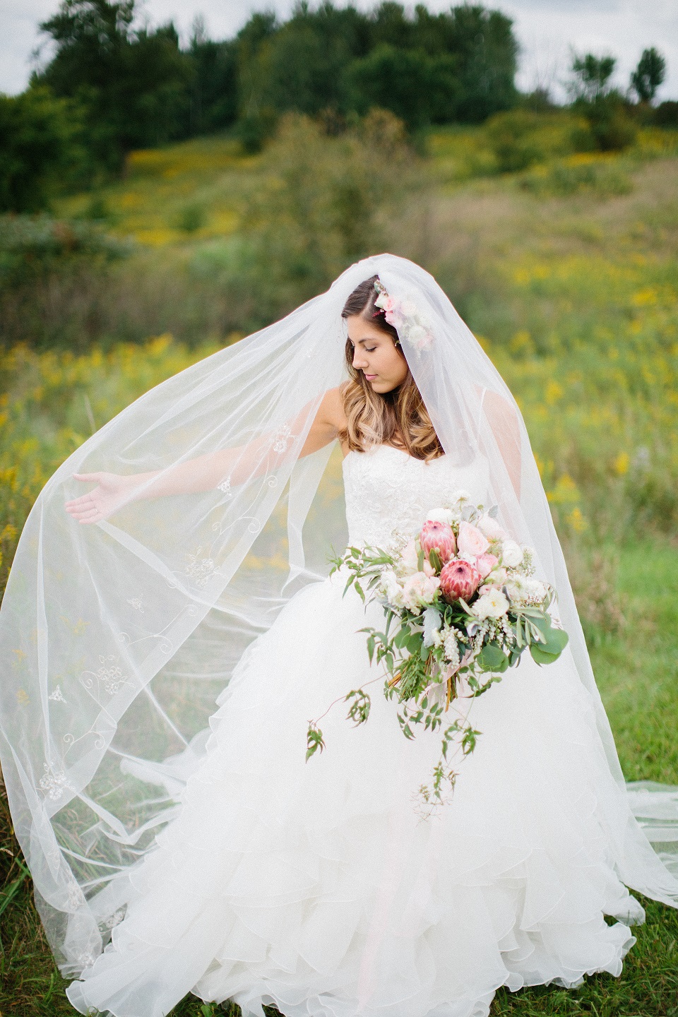 Solo shot of bride Meghan with her David's Bridal wedding dress