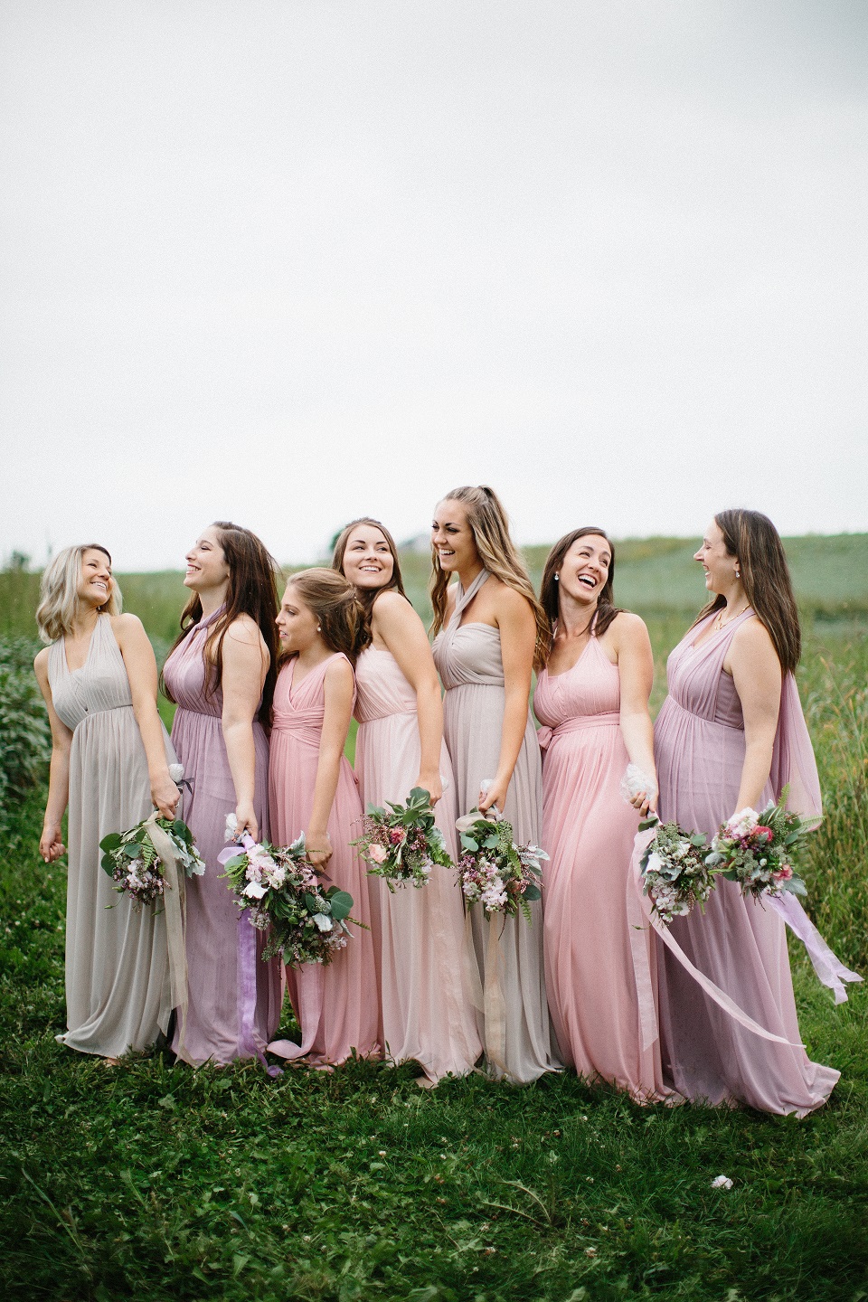 Bride Meghan's bridesmaids in shades of pink and purple