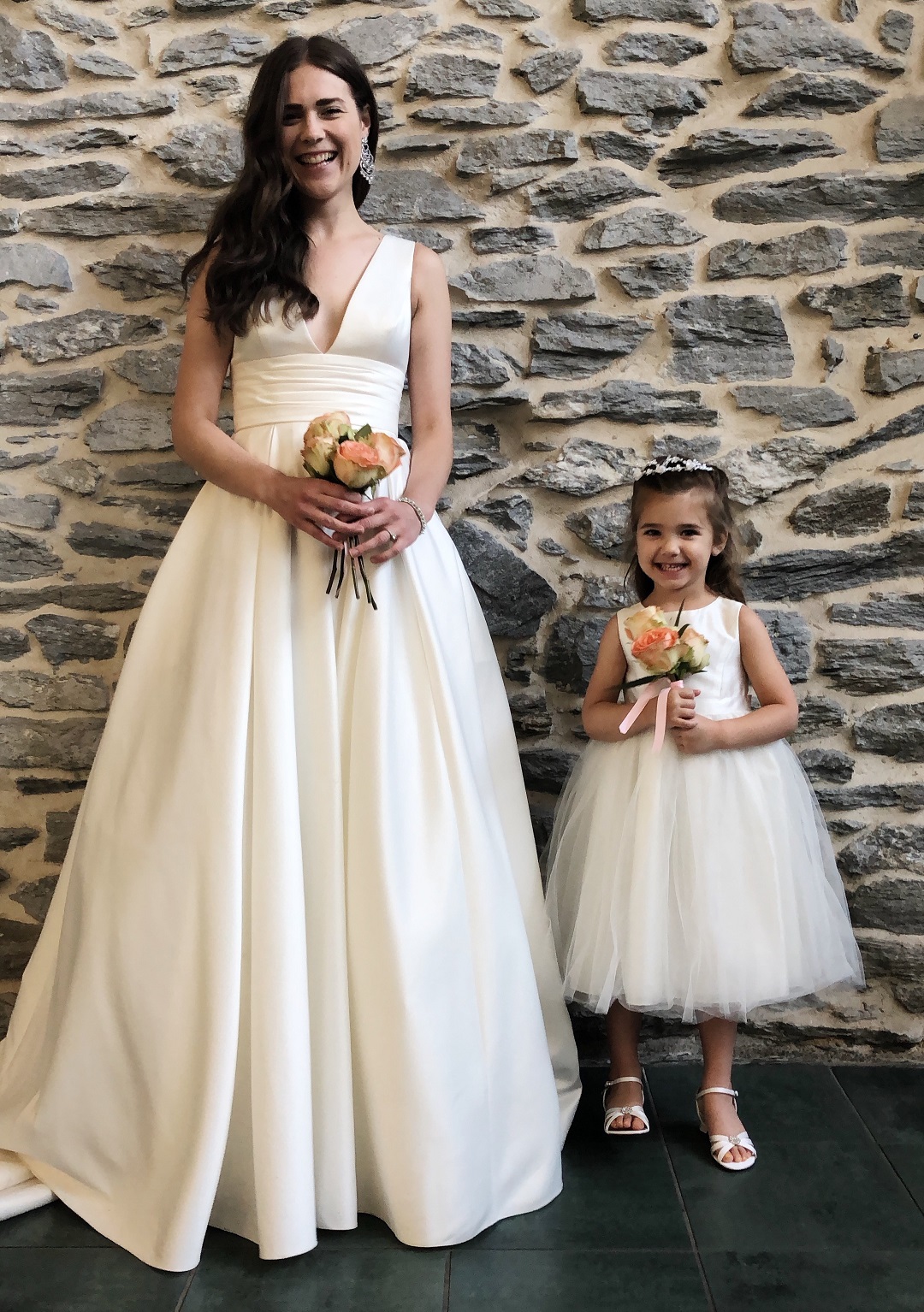 bridal party with flower girl