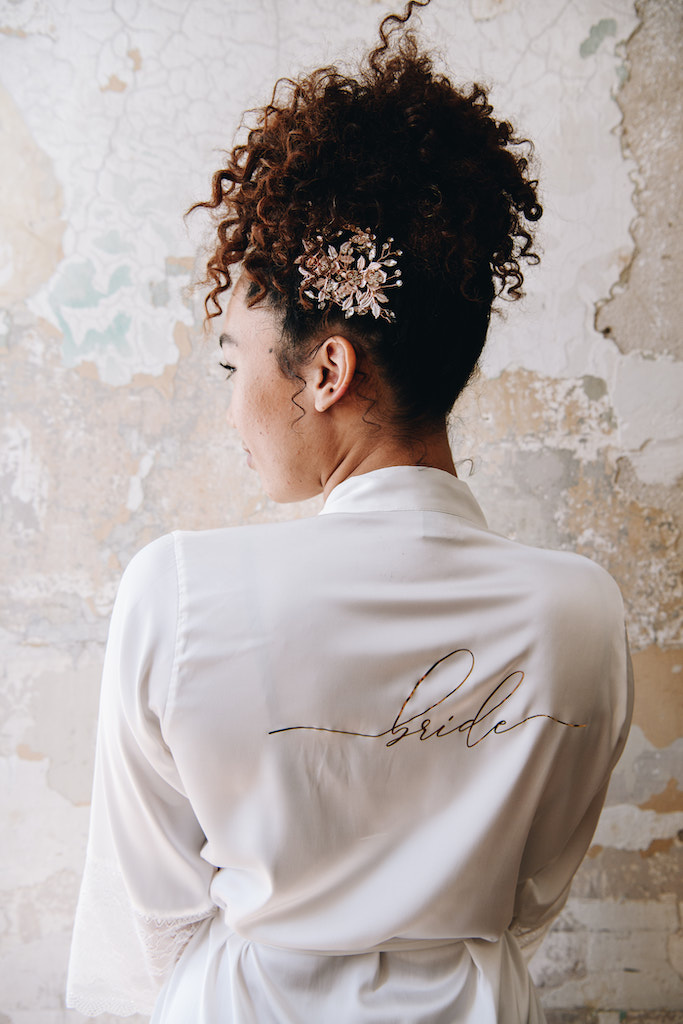 Bride with high up-do for curly hair