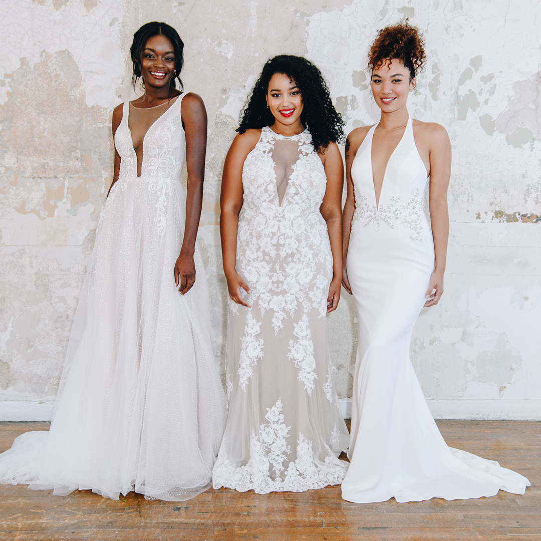 Brides in long wedding dresses with plunging necklines