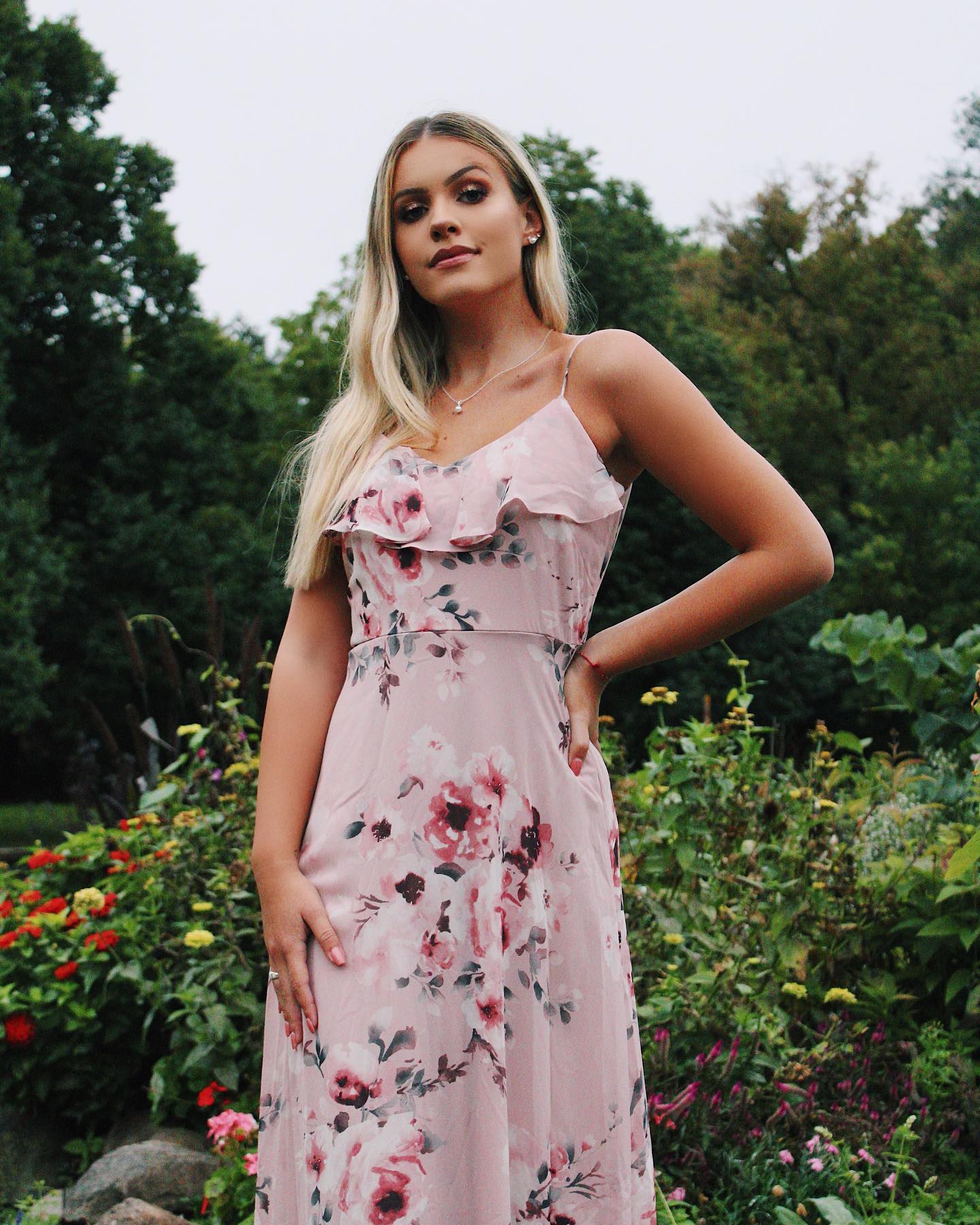 Girl in long pink floral dress