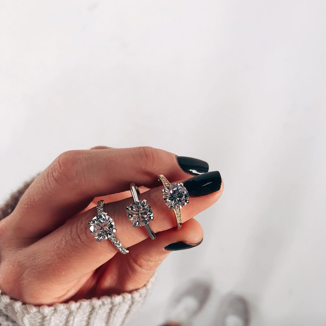 Stack of diamond rings on finger