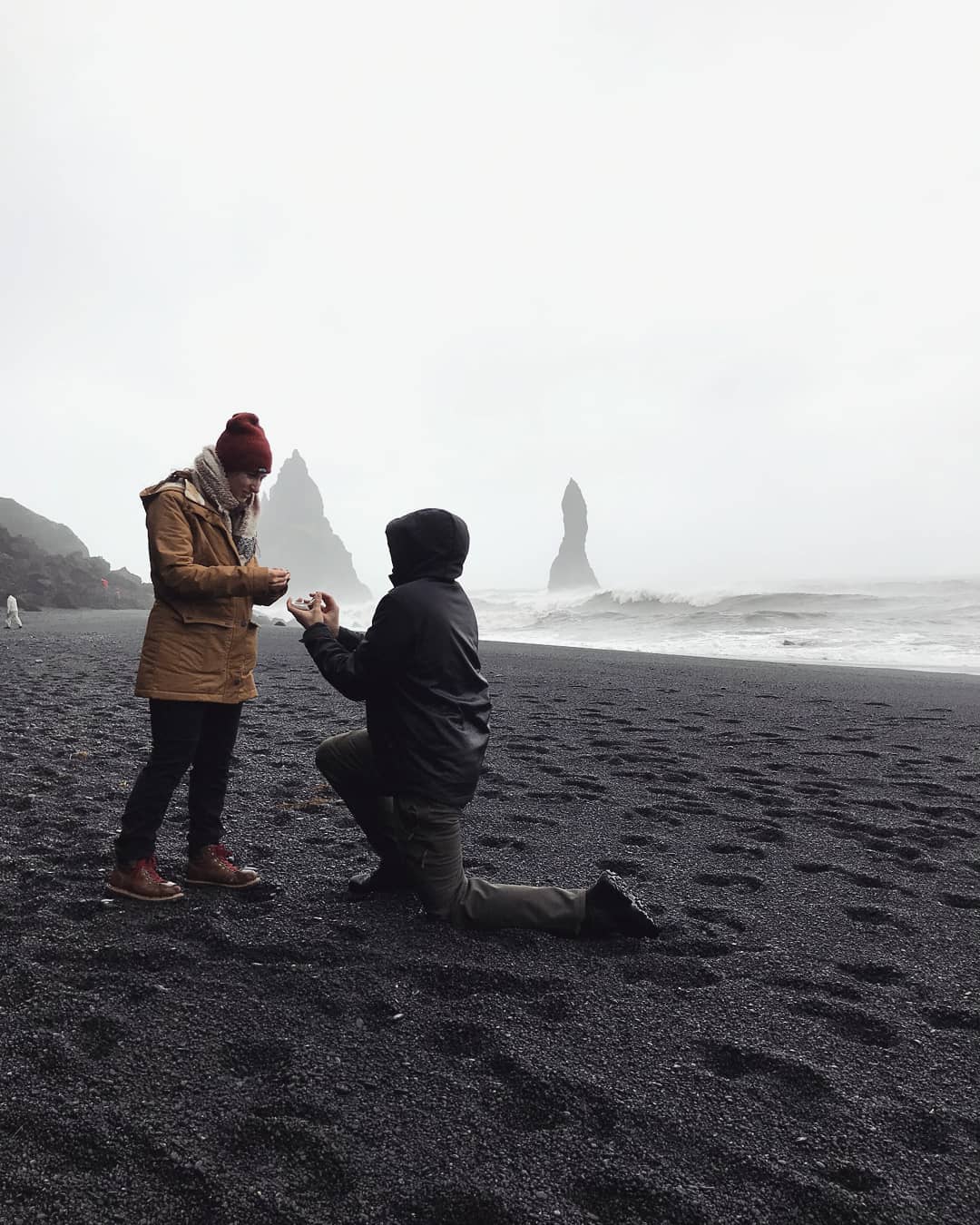 Man proposing to woman in a romantic proposal in Iceland