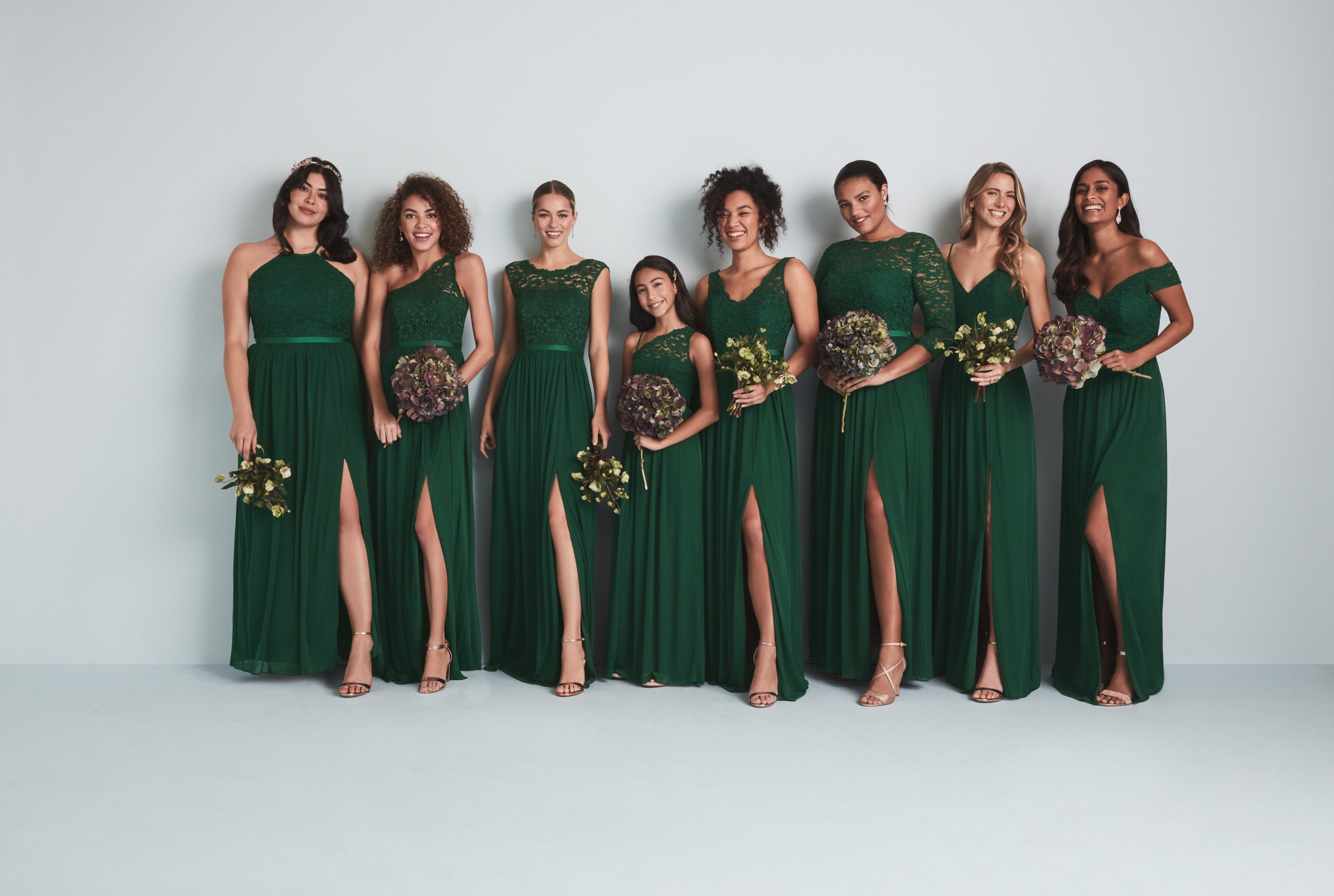 bridesmaids wearing green mix and match bridesmaid dresses