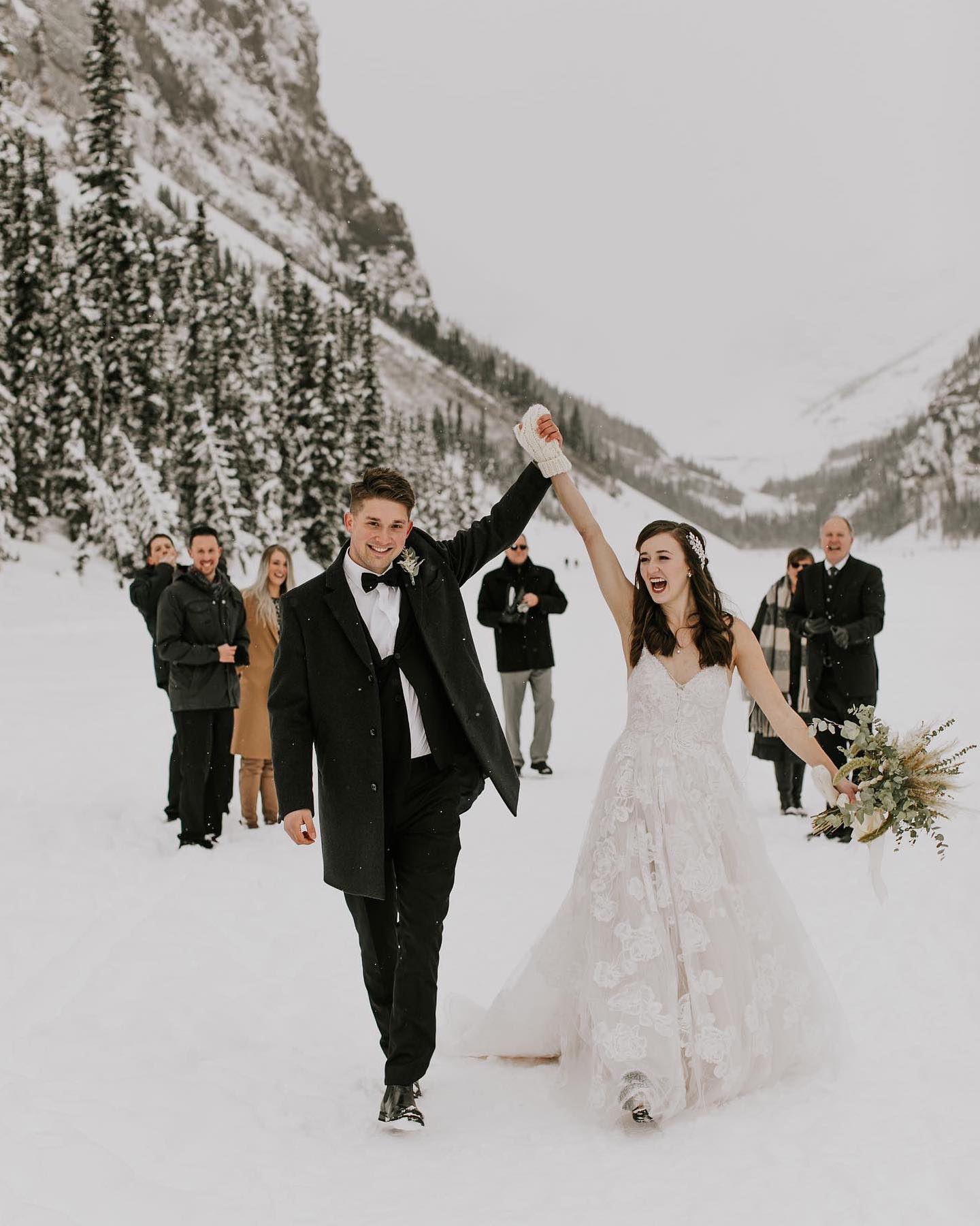 embracing snow on your wedding day