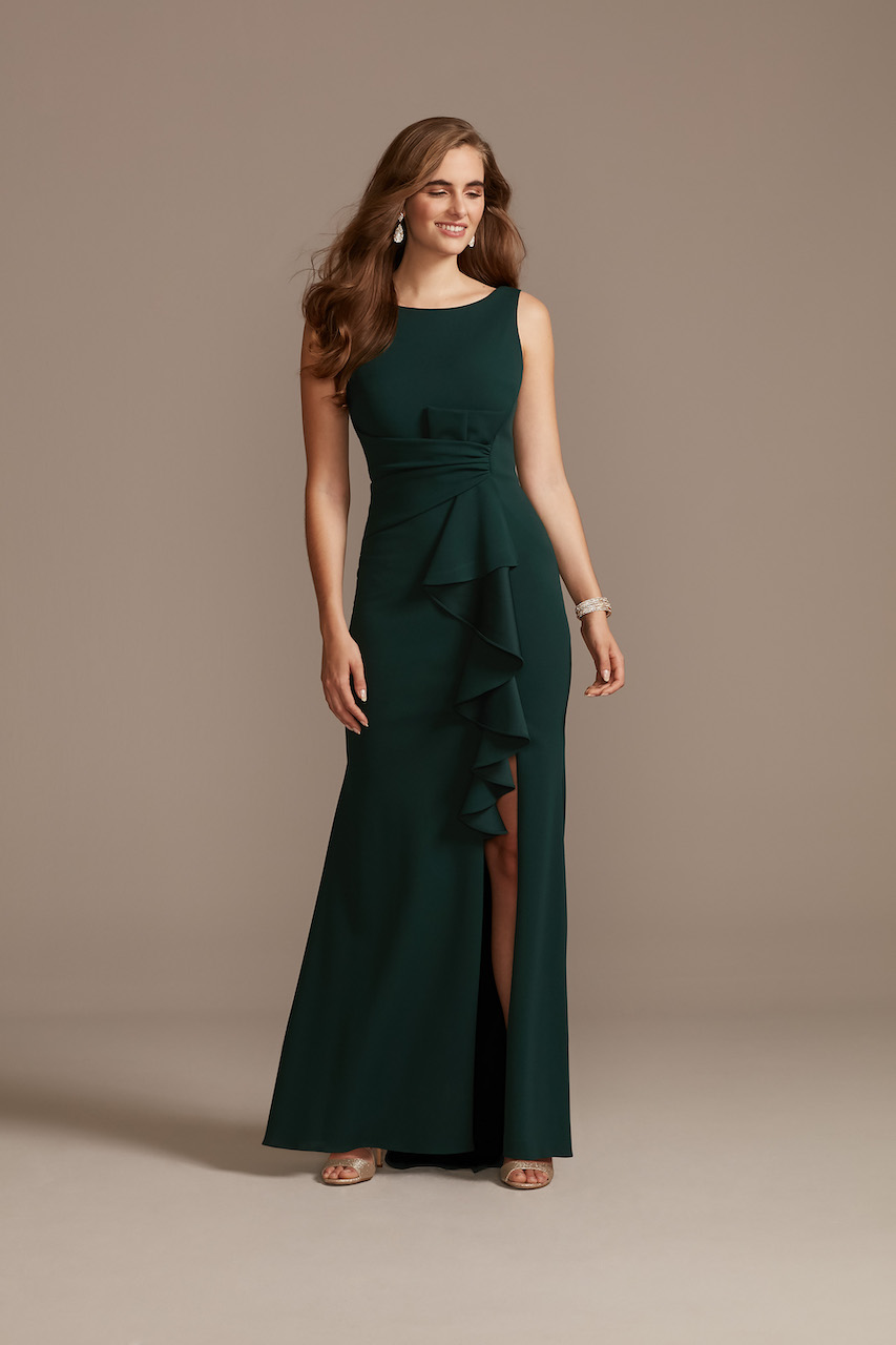 guest of a spring wedding wearing a long formal green dress