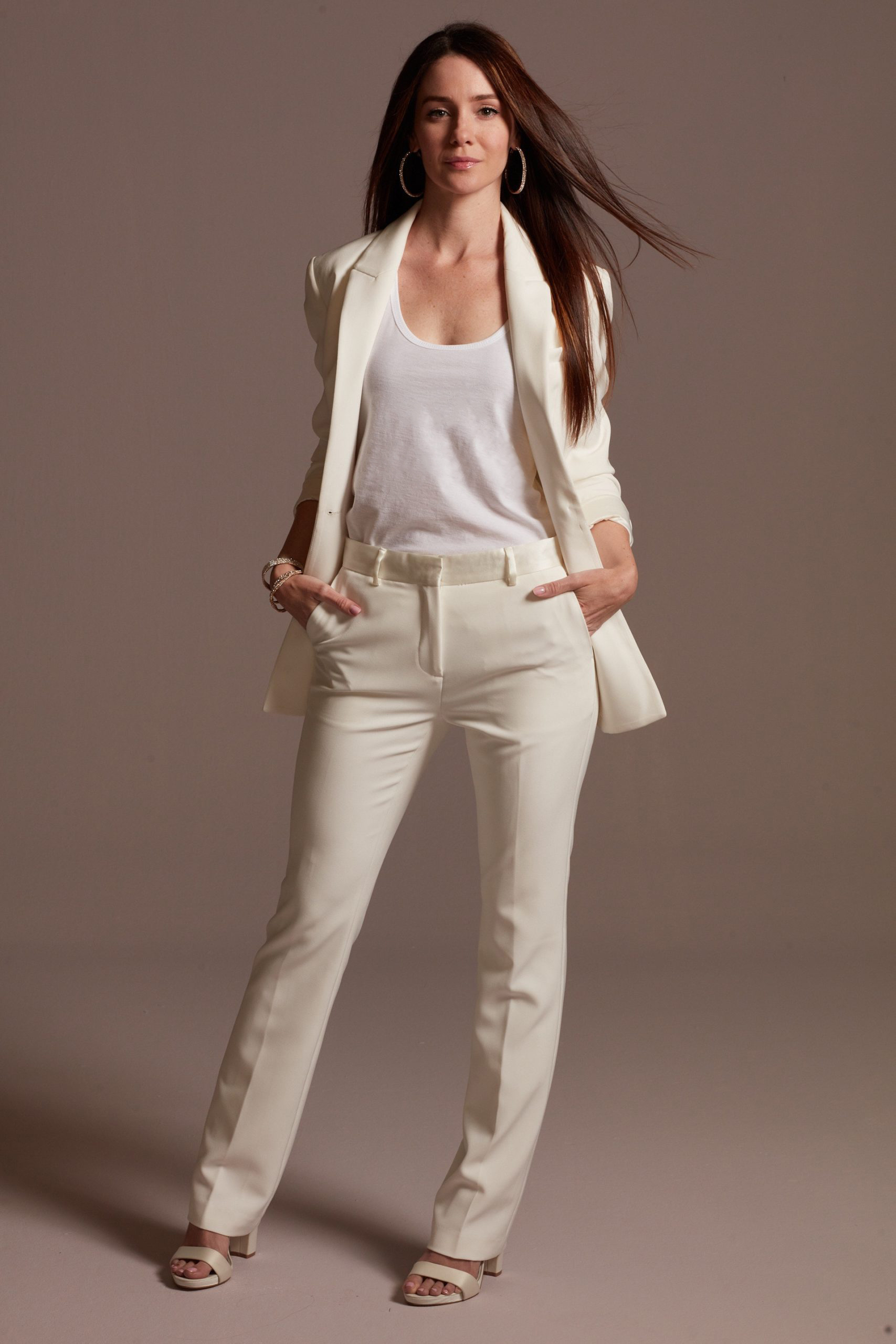 Casually styled white bridal pantsuit