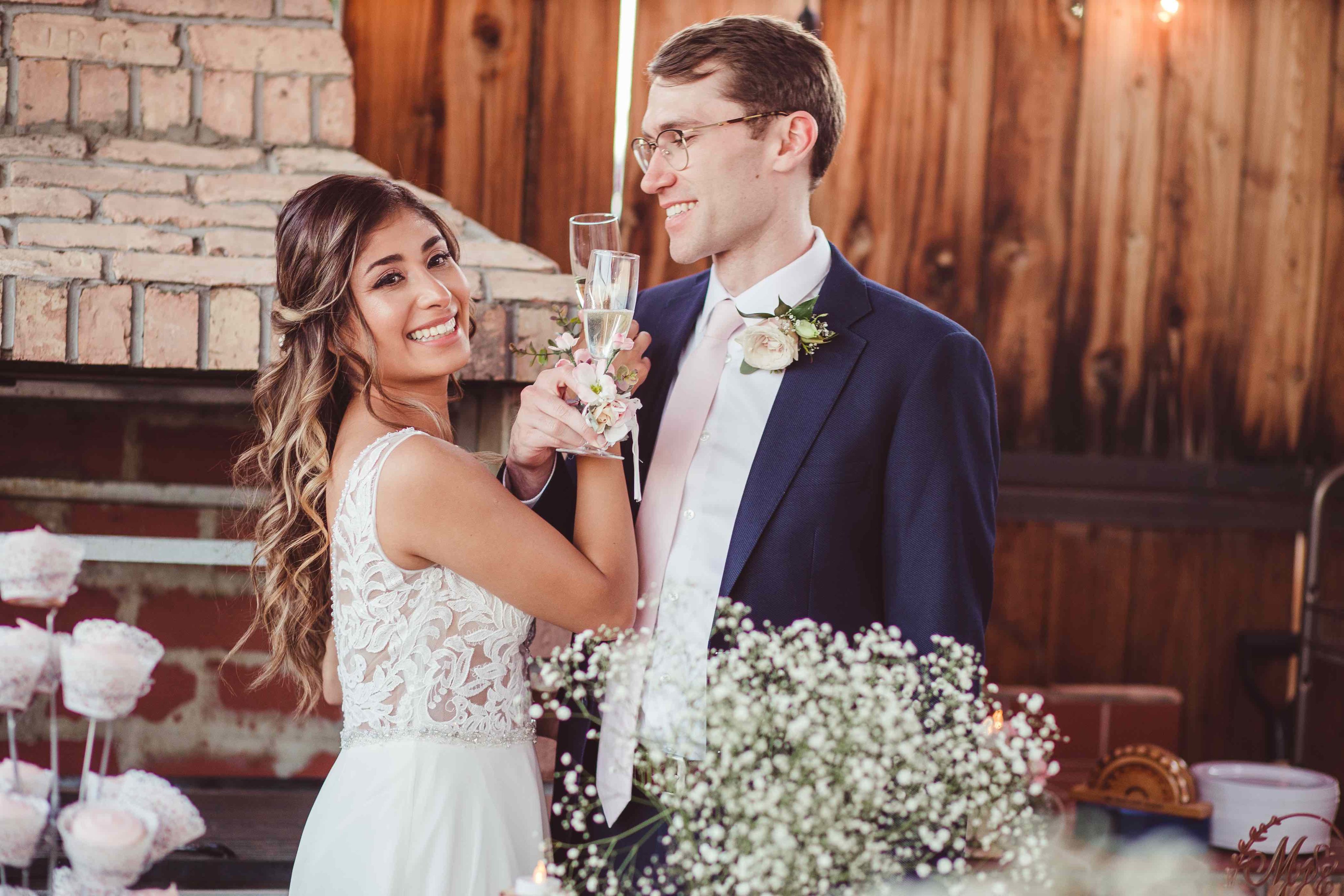 Bride and Groom toasting with champagne