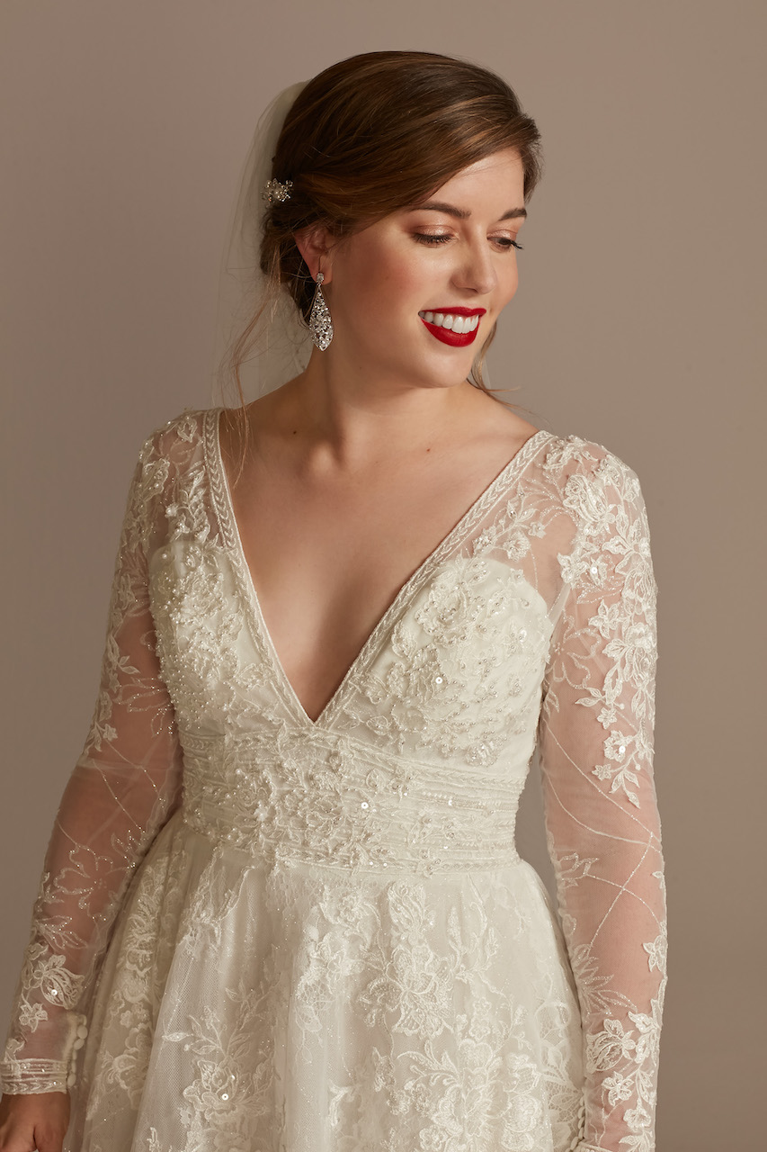Bride wearing a wedding dress with long sleeves