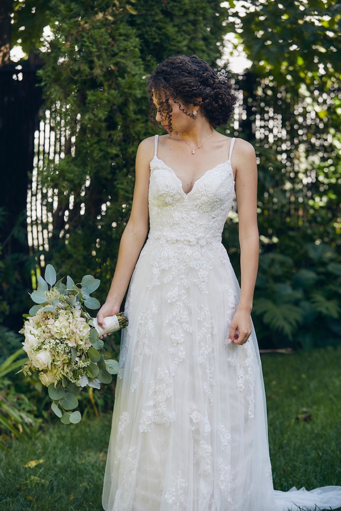 bride wearing white lace a-line dress