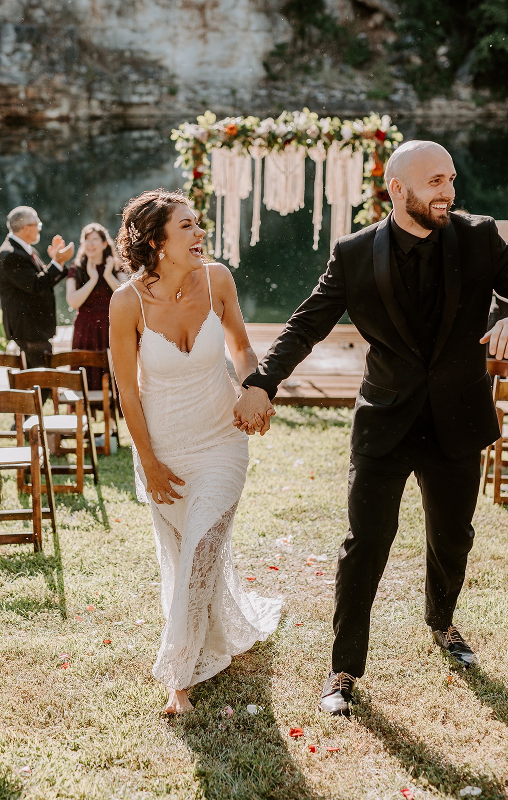 couple walking up the aisle at their micro wedding