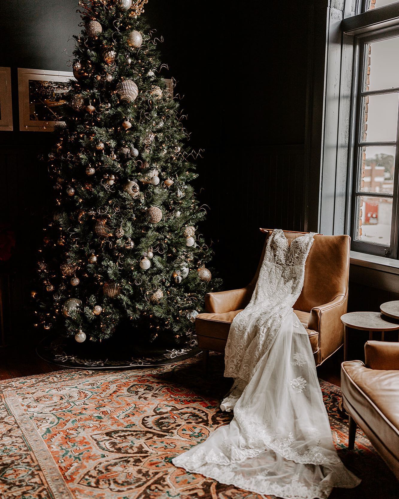 wedding dress in front of Christmas tree