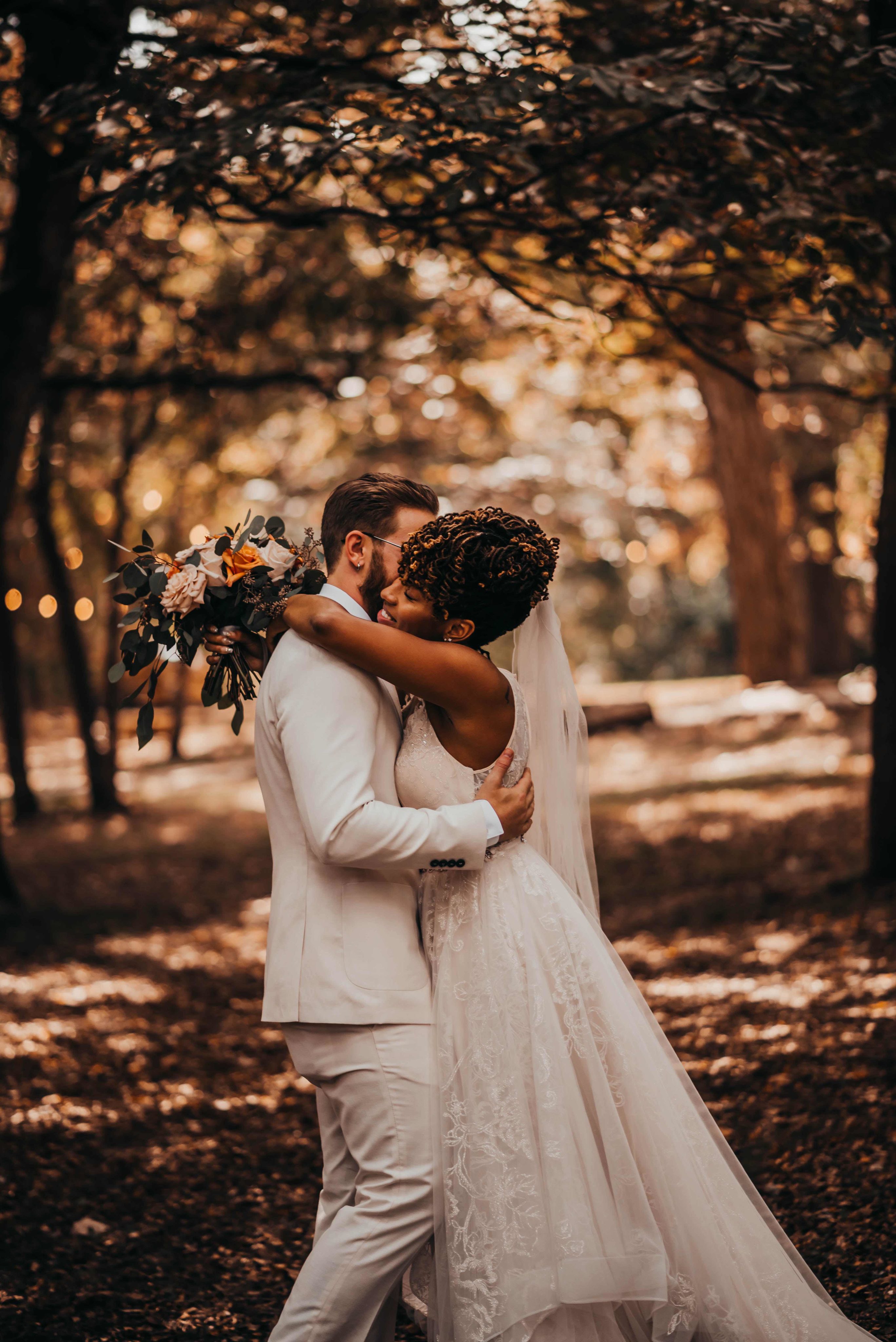 bride and groom hug