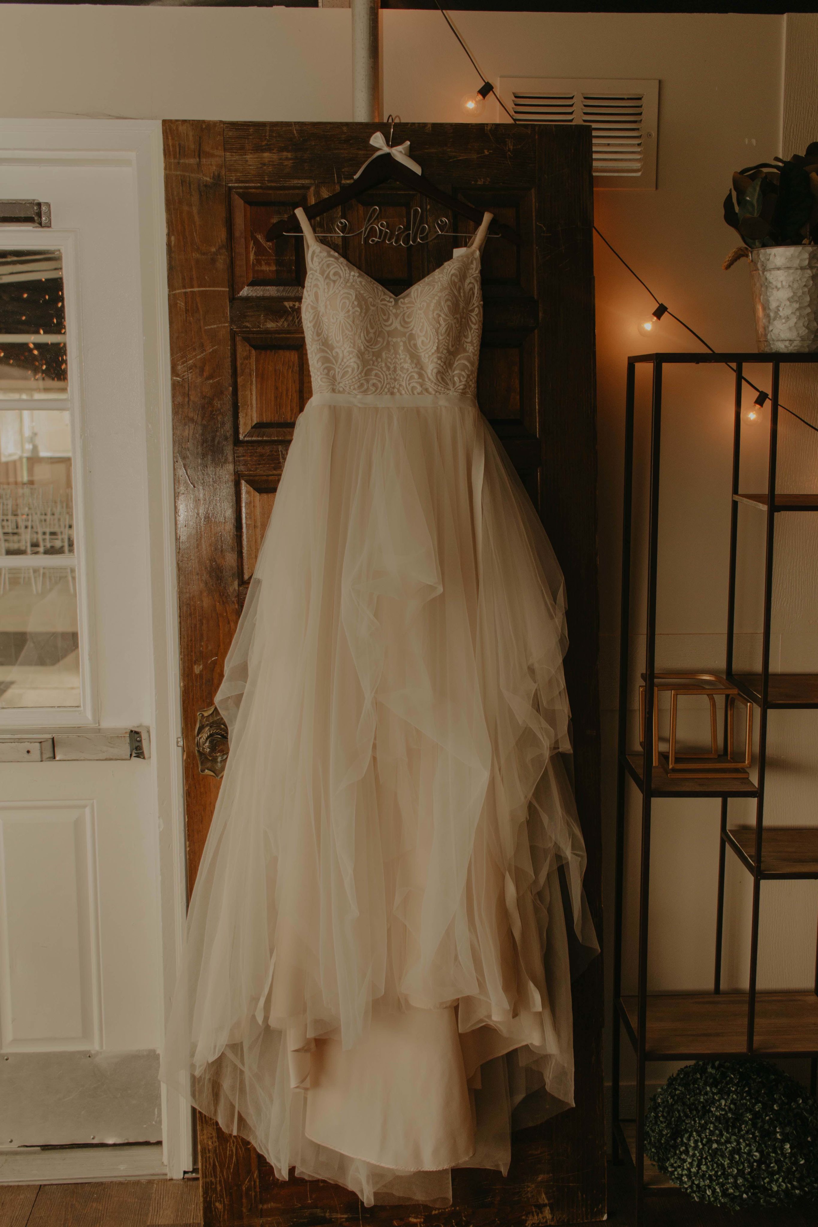 Hanging shot of wedding dress