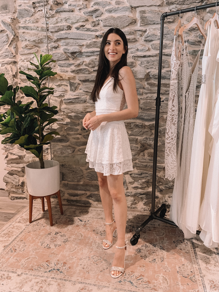 Bride in short fit and flare white dress