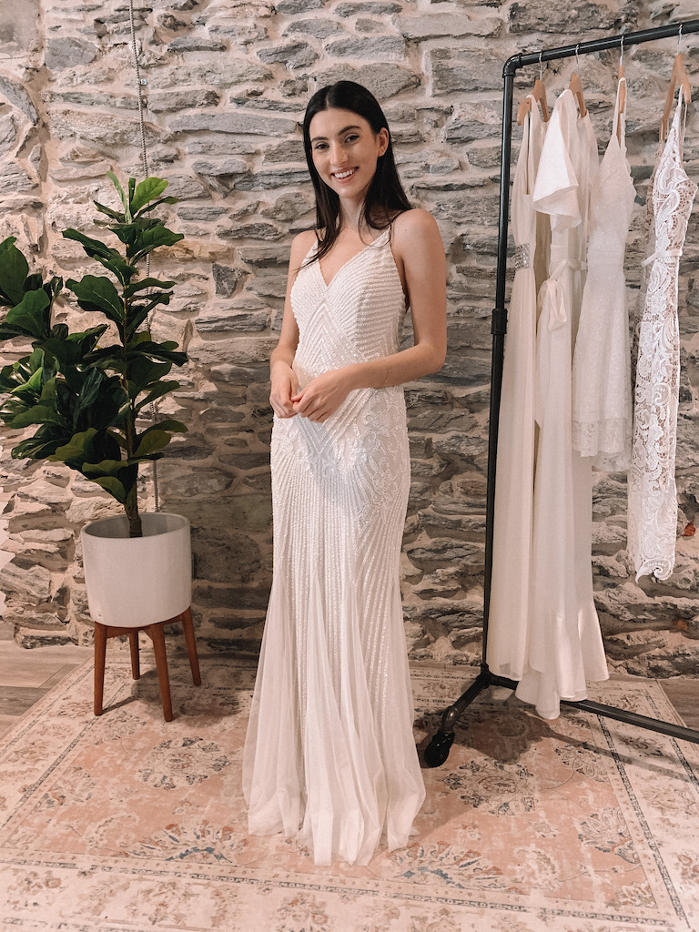 bride in long beaded white dress