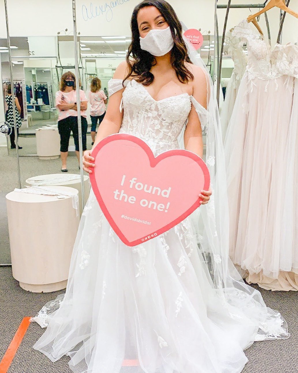 bride in ball gown dress shopping