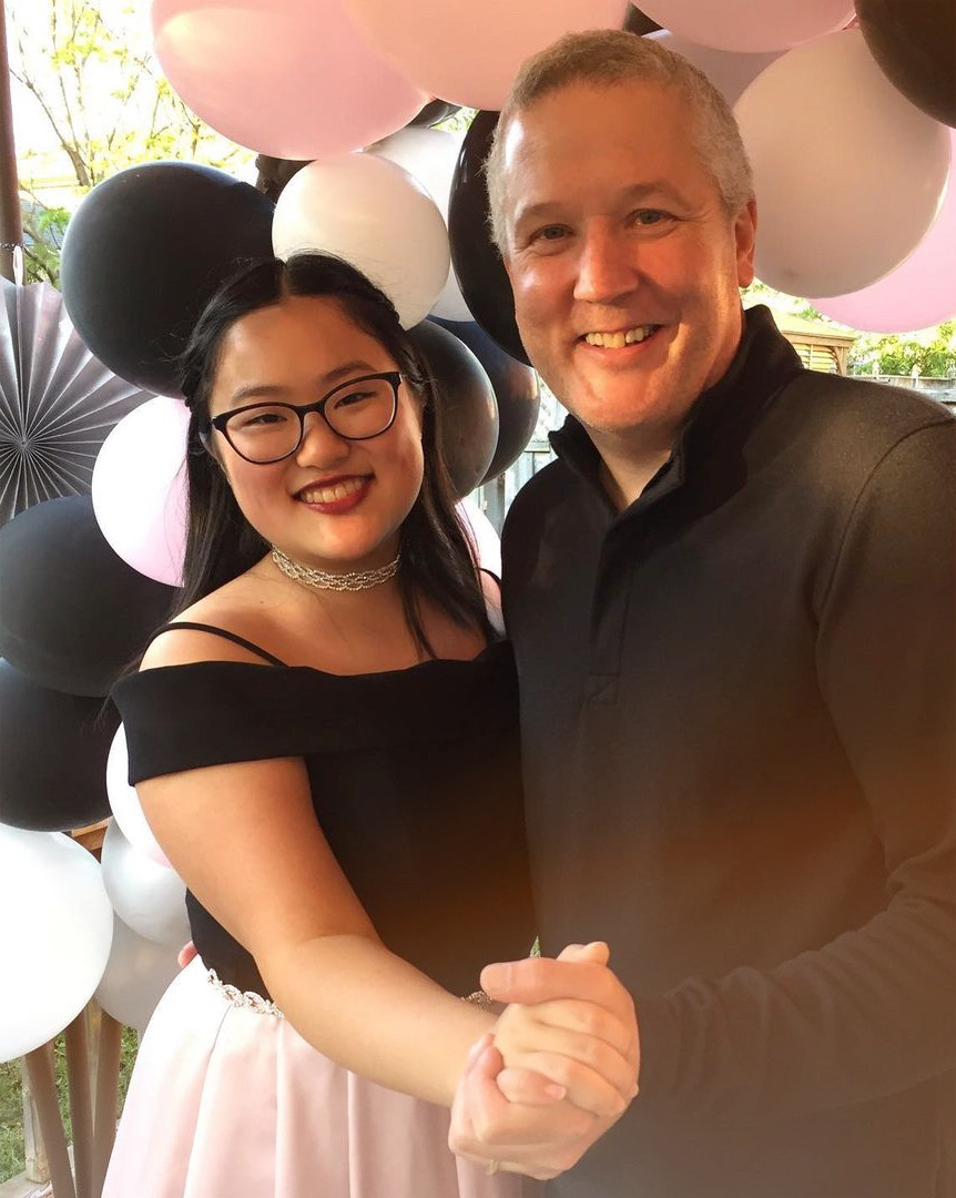 Dad and daughter dancing