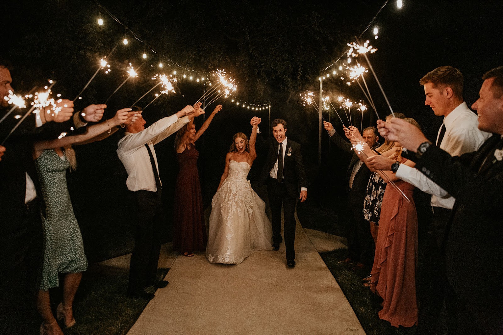 Bride and groom sparkler exit