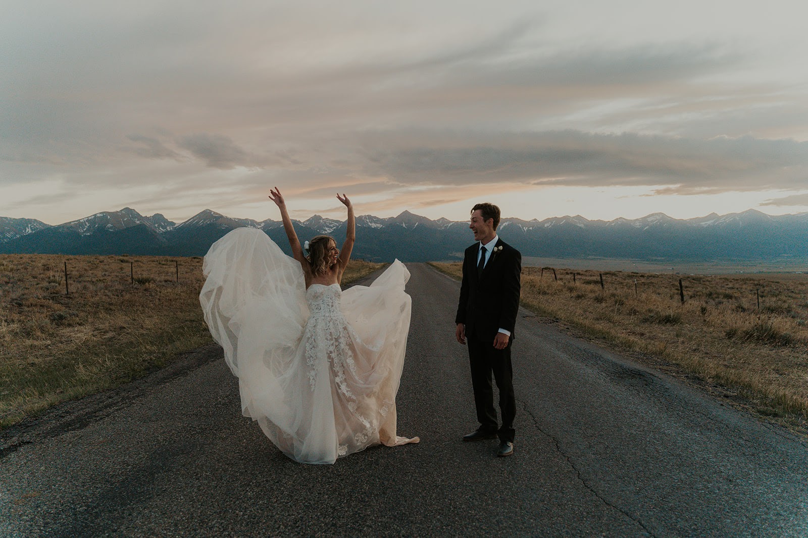 Bride and groom at sunset in the mountains