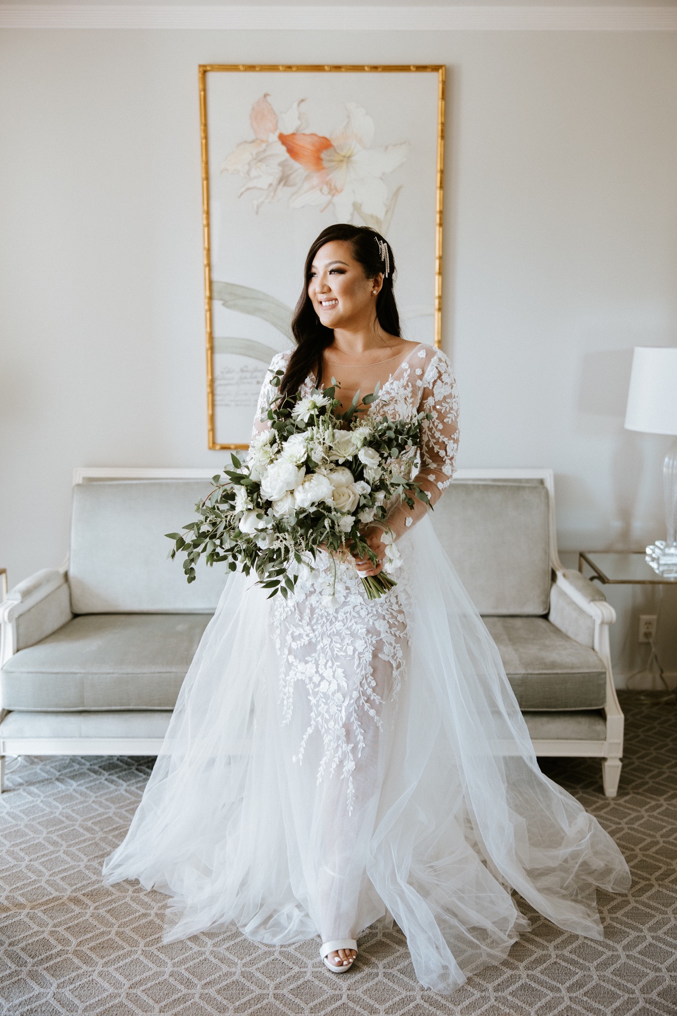 Bride in wedding dress holding flowers