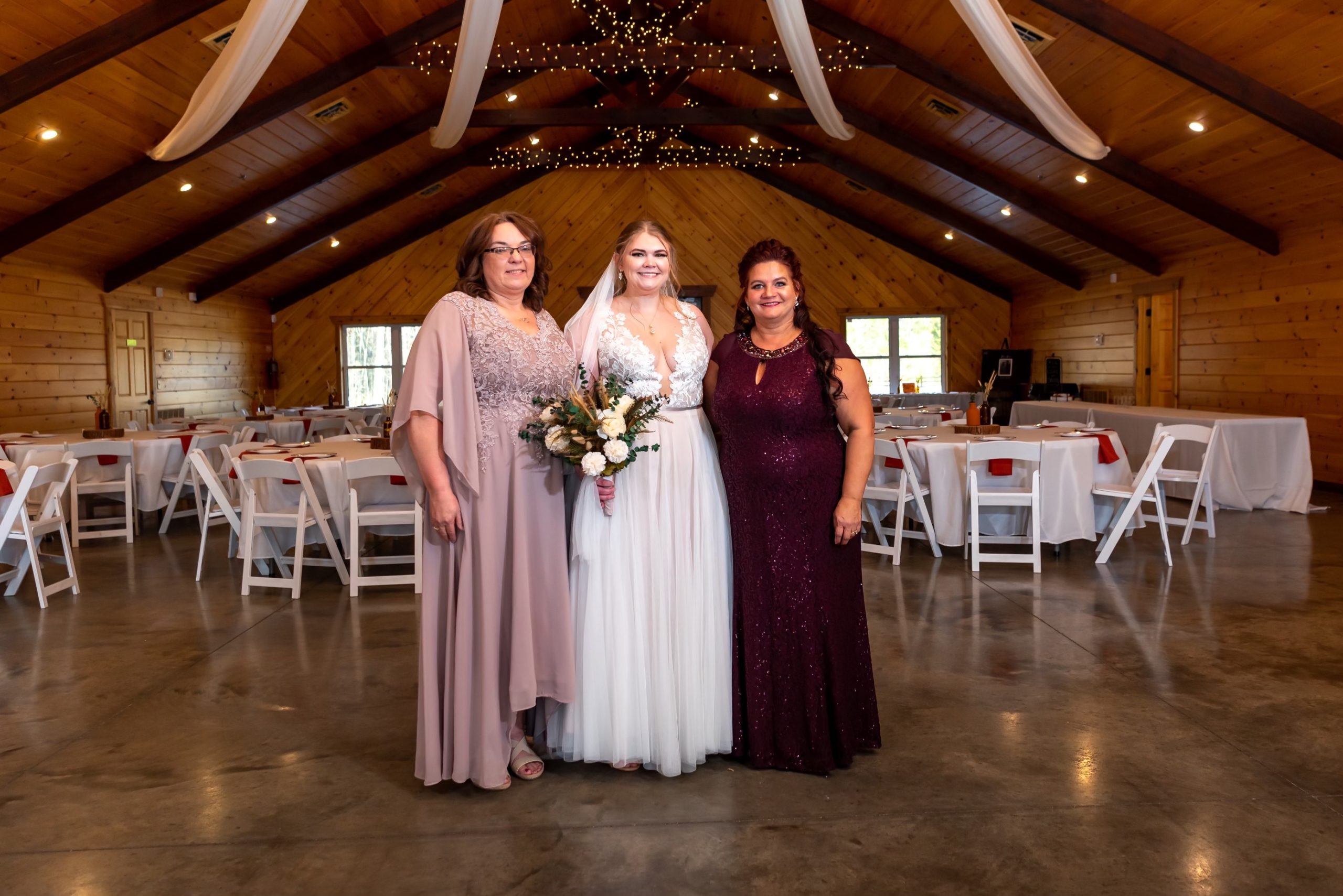 Bride with mother of the bride and mother of the groom in DB