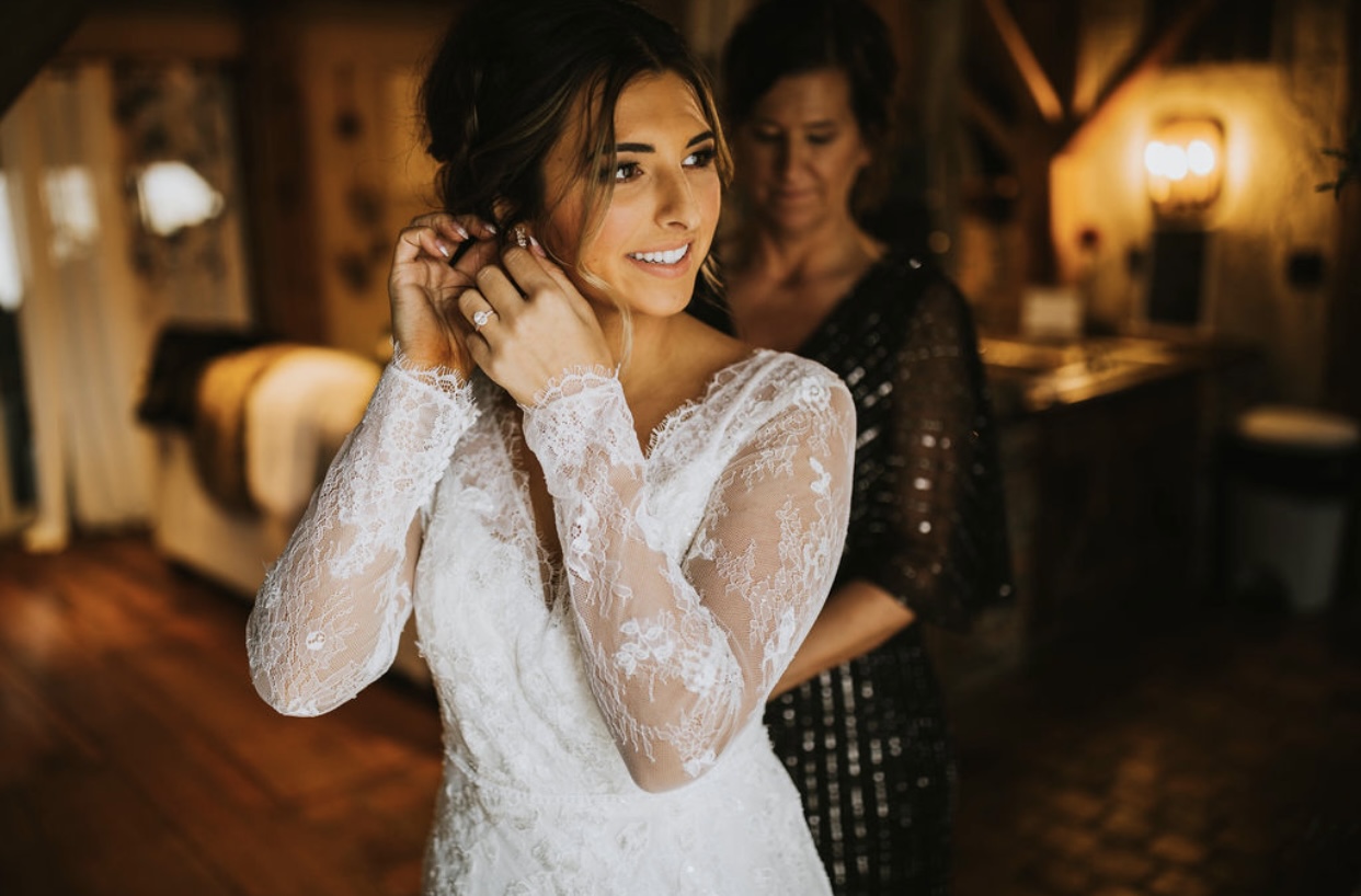 Bride getting ready with help from mom