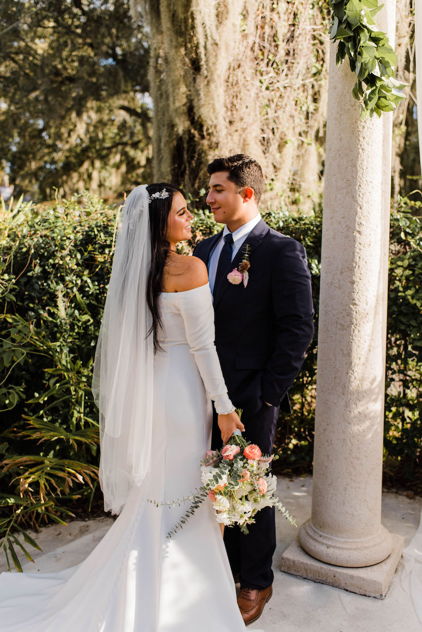 bride and groom embracing