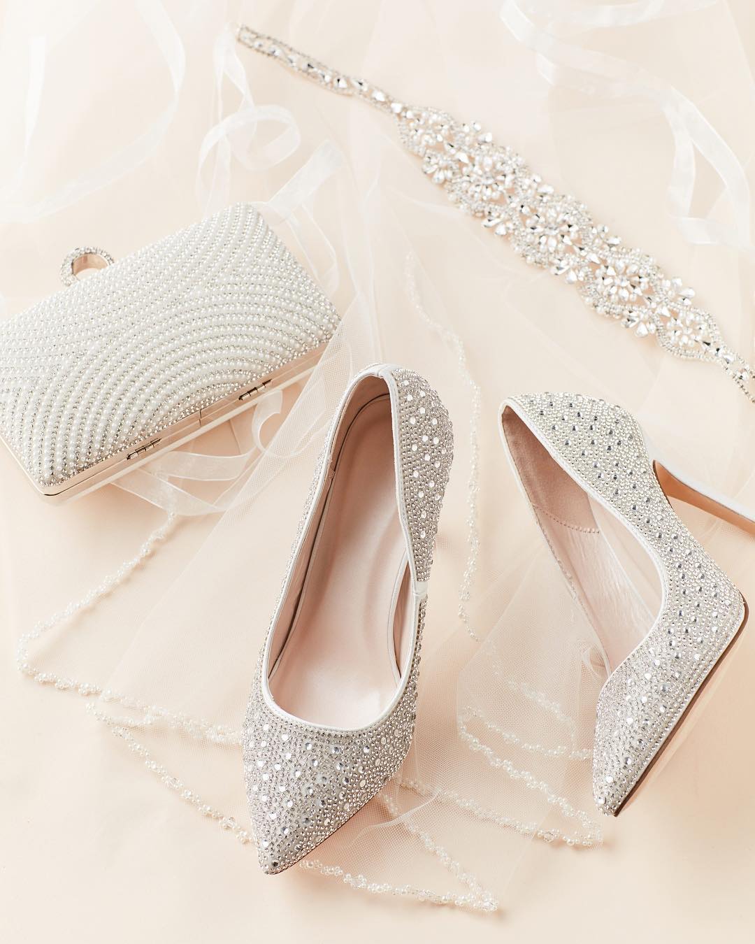 crystal studded bridal heels with matching handbag and sash