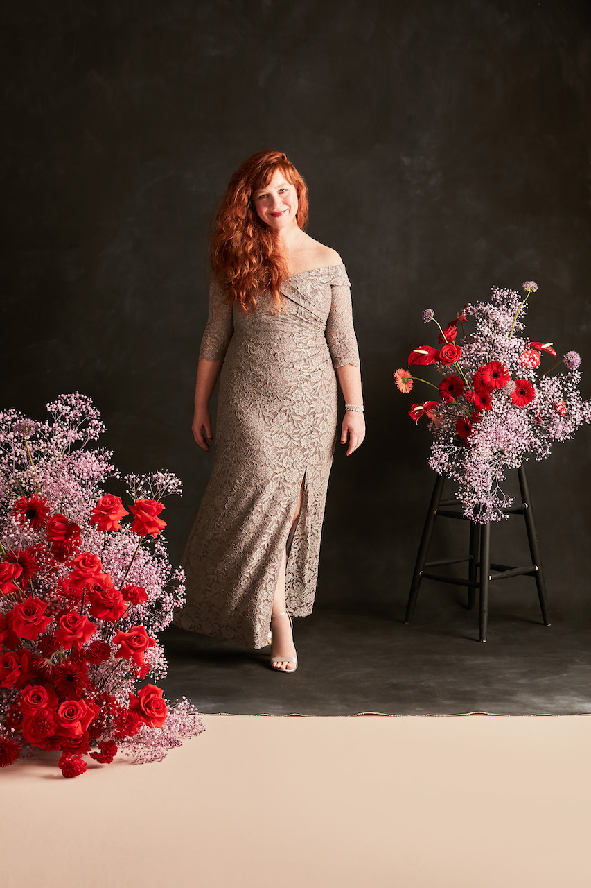 guest of spring wedding wearing off-the-shoulder V-neck ruched lace gown