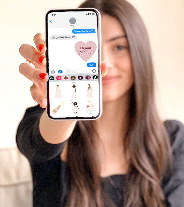woman holding iPhone with BrideMojis GIFs in a text message