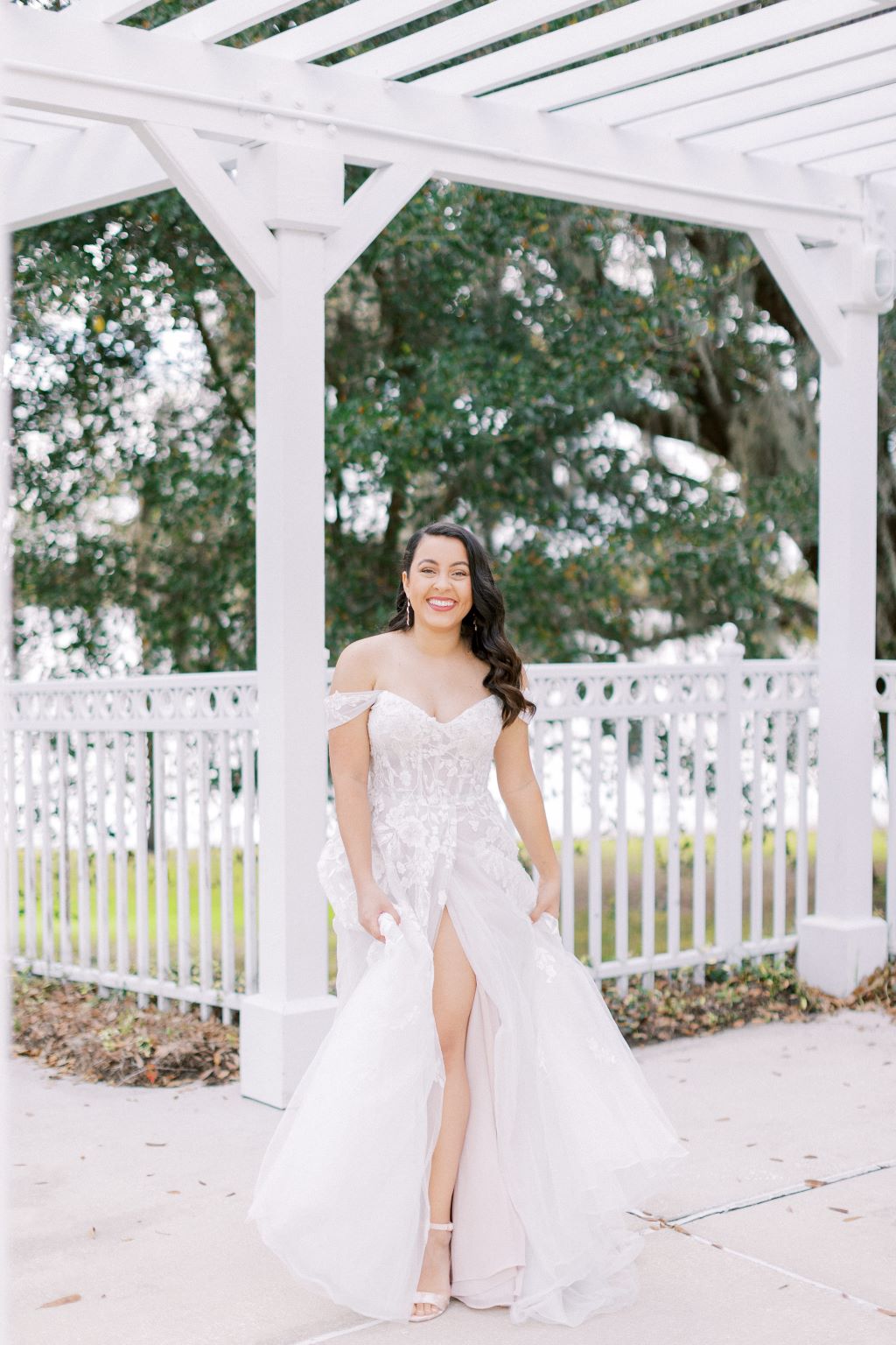 bride showing off dress