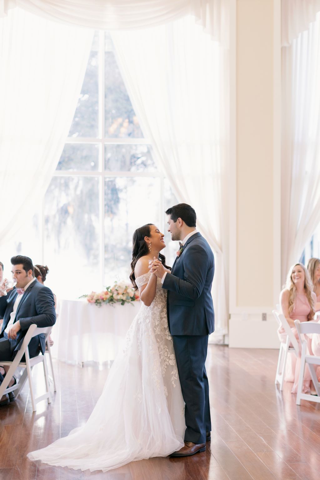 bride and groom dancing to first dance song